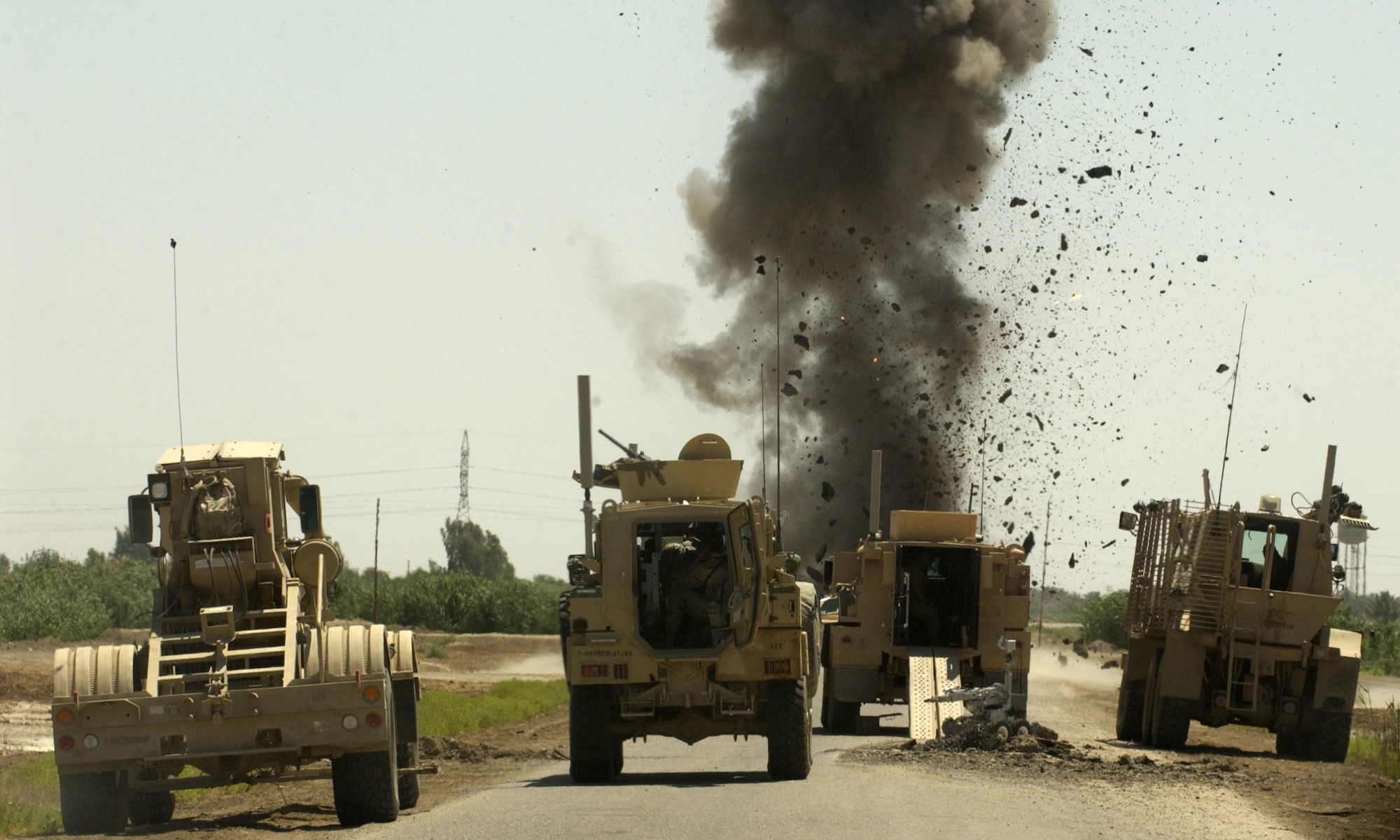 Members of Alpha Company, 2-101 Brigade Troops Batallion, 2nd Brigade Combat Team, 101st Airborne (Air Assault) and U.S. Air Force Explosive Ordnance Disposal detonate an Improvised Explosive Device May 25, 2006 in Baghdad, Iraq. They were successful on the day finding a total of 6 IEDs.  U.S. Air Force photo by Senior Airman Richard Rose. (Released)
             