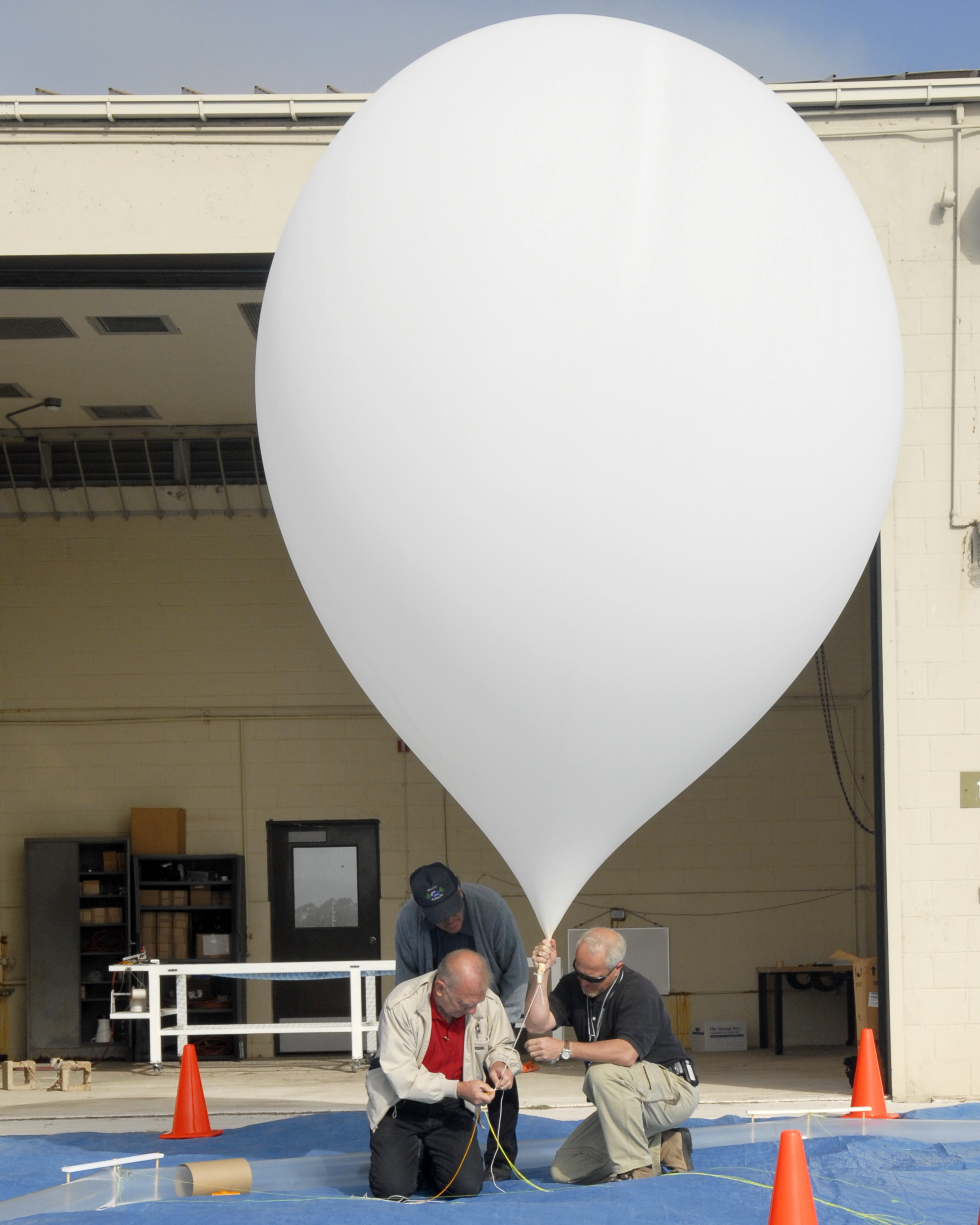 Airborne laser balloon launched