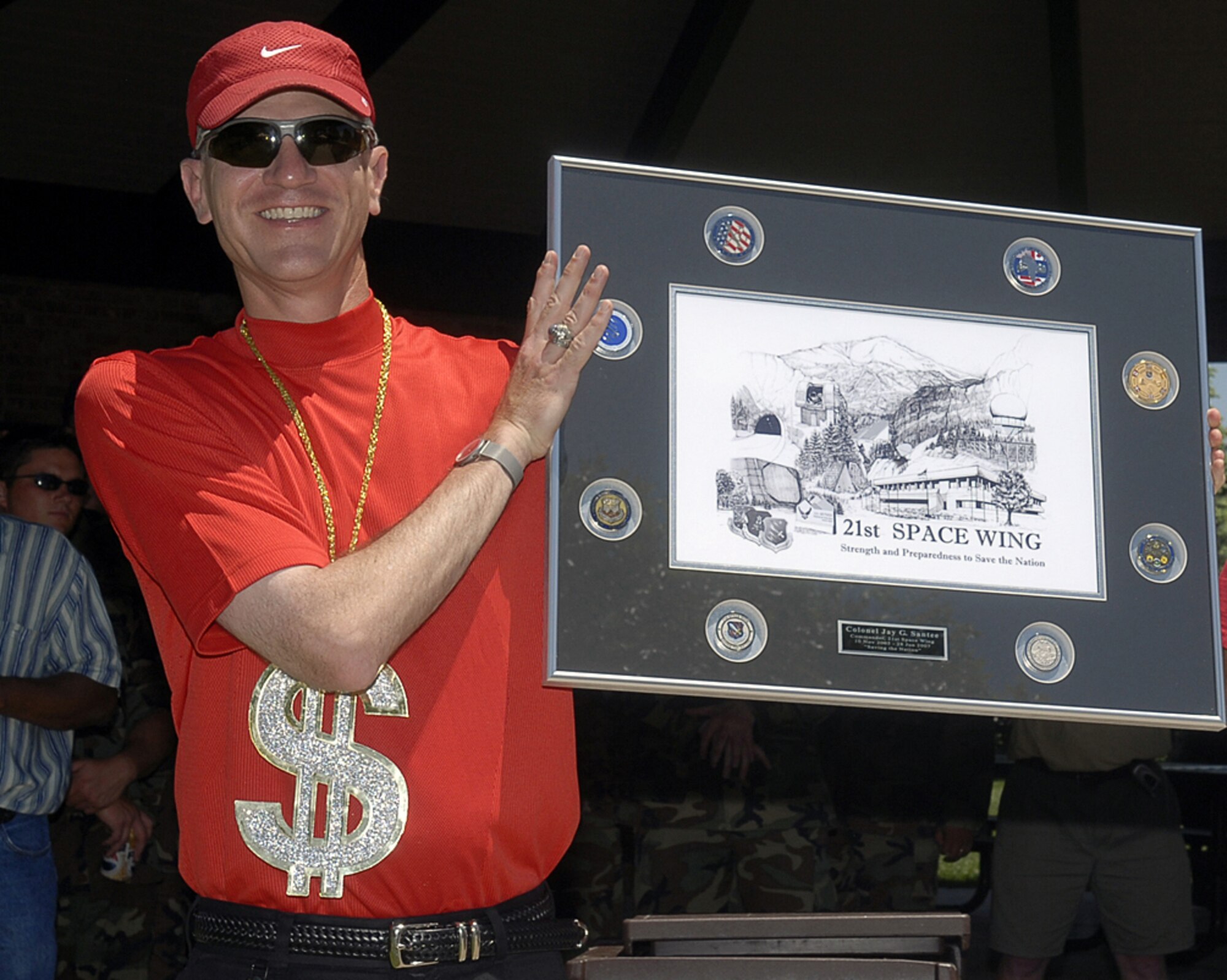 Hundreds turned out for Col. Jay Santee’s farewell barbecue June 15 at Eagle Park. Colonel Santee leaves his post as 21st Space Wing commander June 28 to become vice commander, 14th Air Force at Vandenberg Air Force Base, Calif. (U.S. Air Force photo by Rob Bussard)