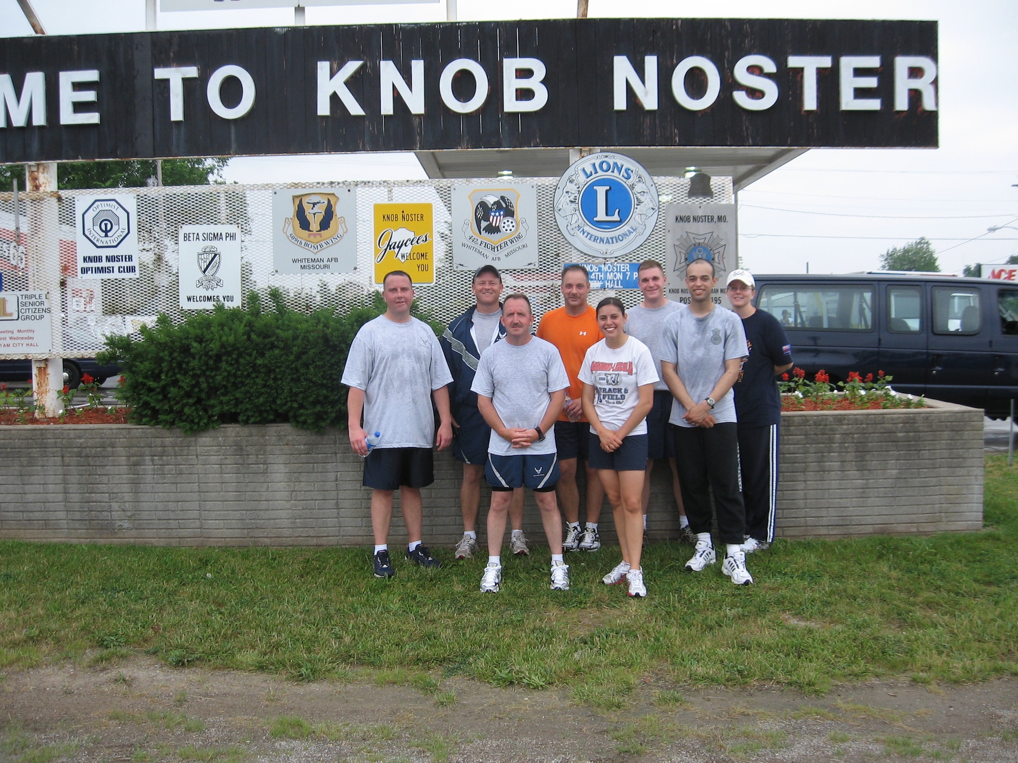 (Front row, left to right) Senior Master Sgt. Bryan Sanders, Airmen 1st Class Taija Velasquez and Jason Baldridge. (Back row, left to right) Master Sgt. Ed Paxton, Chief Master Sgt. Robert Rush, Master Sgt. Ray Mancini, Tech. Sgt. Jason Hera, all from the 509th Security Forces Squadron, and Ingrid Durbin, Whiteman U.S. Protect, teamed up to carry the Special Olympics Missouri torch May 30. The 509th SFS team ran more than 73 miles and helped police units around the state raise more than $1 million for 22,000 Special Olympics Missouri participants. (Courtesy photo)