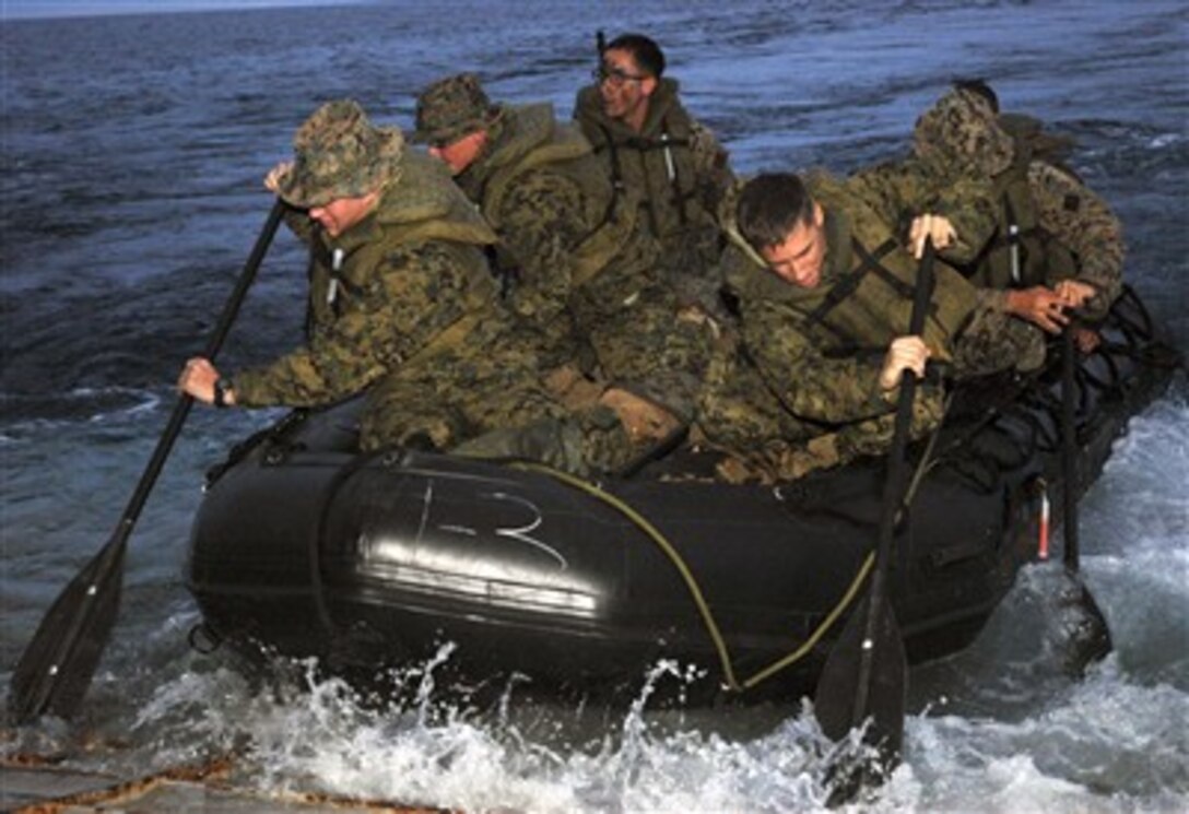 Members of 31st Marine Expeditionary Unit launch a combat rubber raiding craft from the amphibious landing dock USS Juneau in the Pacific Ocean, June 19, 2007, as part of Exercise Talisman Saber 07.
