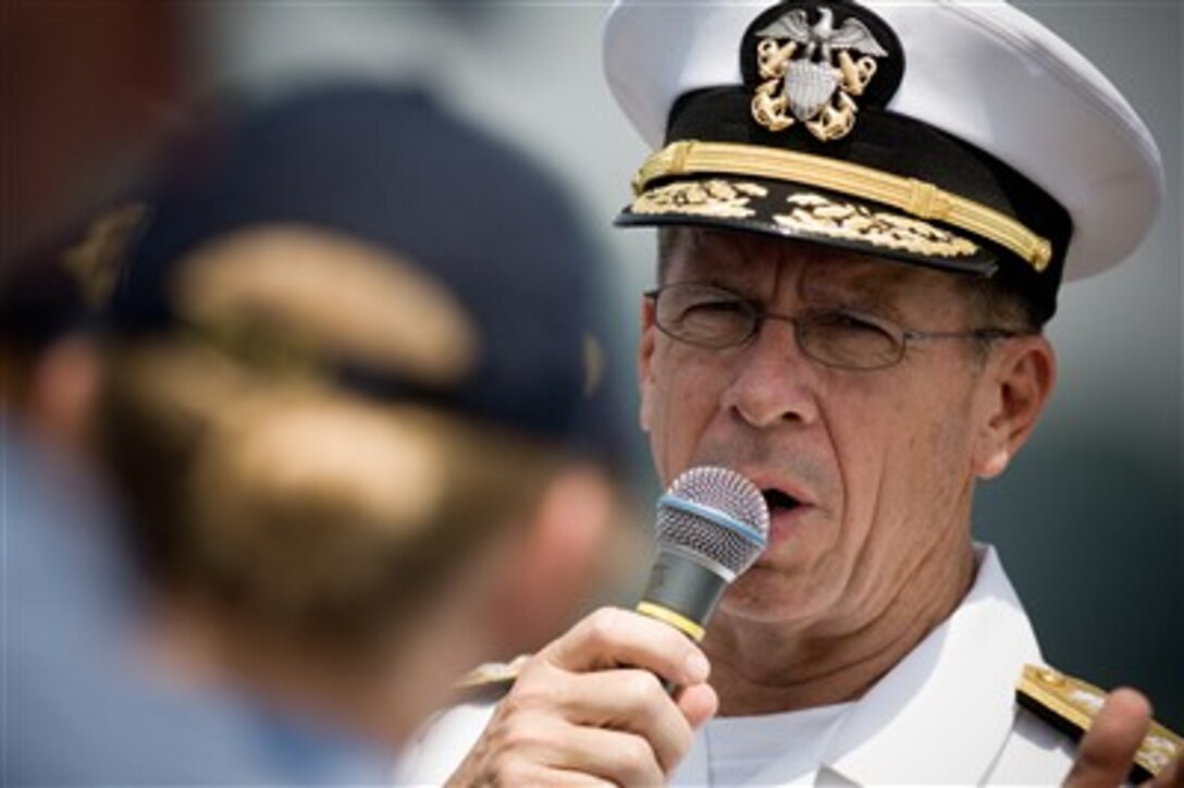 Chief of Naval Operations Adm. Mike Mullen holds an all-hands call with sailors on the fantail of USS Curtis Wilbur during a visit to U.S. Fleet Activities Yokosuka, Japan, June 19, 2007. Mullen is on a seven-day trip to Japan and Vietnam to visit with counterparts and sailors.