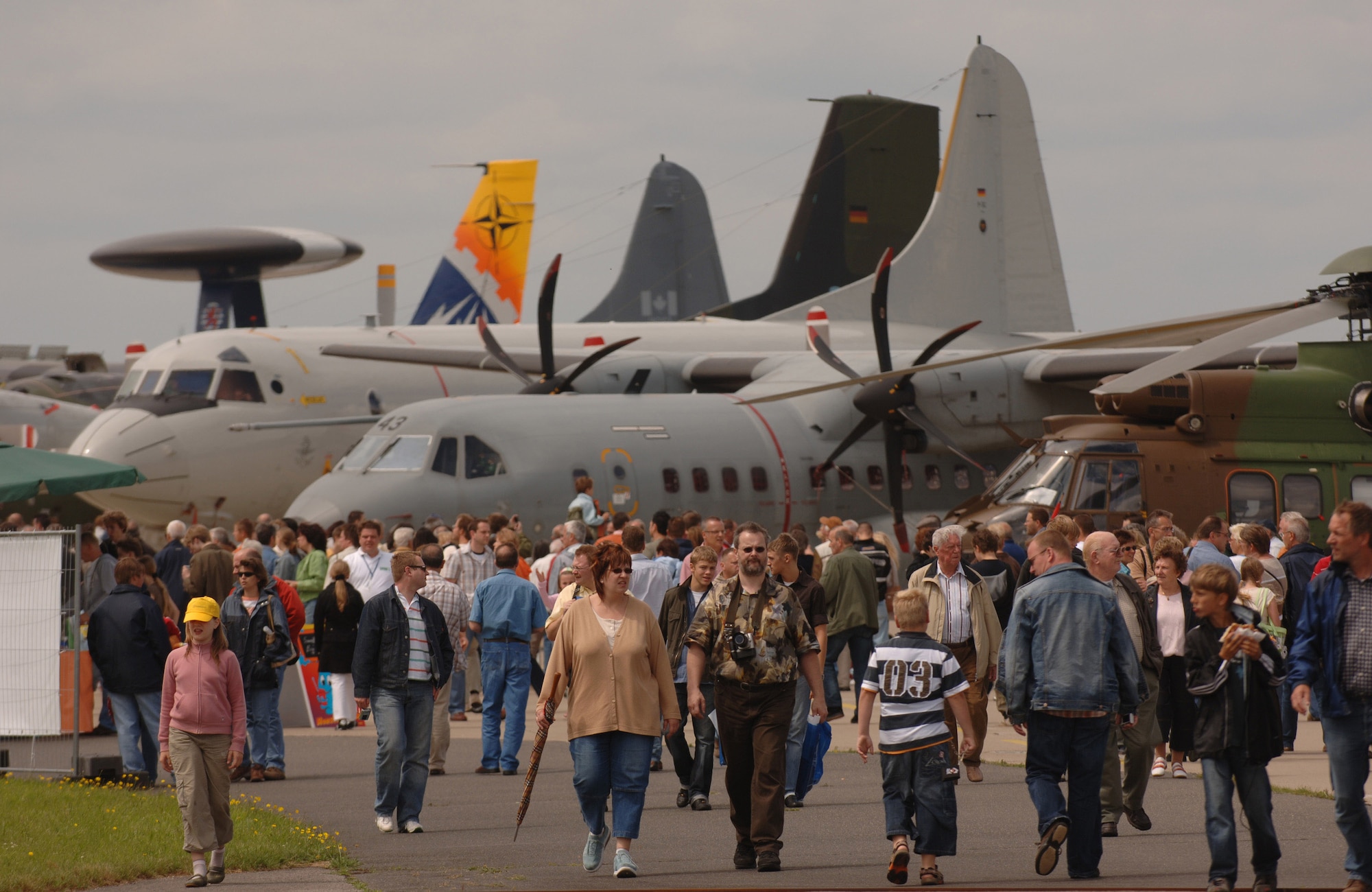 Several thousand German, Belgian and Dutch citizens visit Geilenkirchen NATO Air Base, Germany, to attend the 25th anniversary celebration of the NATO E-3 Airborne Early Warning and Control Force aircraft's initial operations out of the NATO installation in northern Germany June 16. (U.S. Air Force photo/Master Sgt. Scott Wagers)
