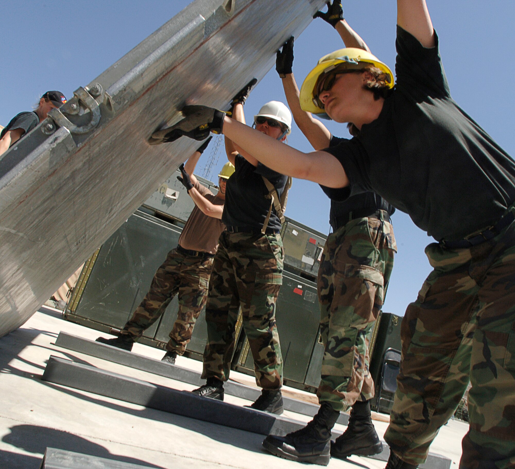 MOUNTAIN HOME AIR FORCE BASE, Idaho -- Members from the 366th Communications Squadron ensure pallets are in usable condition to ship to deployed locations during the first phase of exercise Sharpshooter 07-02 June 21. The Air Expeditionary Force Communications Element has 36 hours to pack classified and unclassified equipment to support deployed email and phone services after getting a deployment order. (U.S. Air Force photo/Airman 1st Class Stephany Miller)
