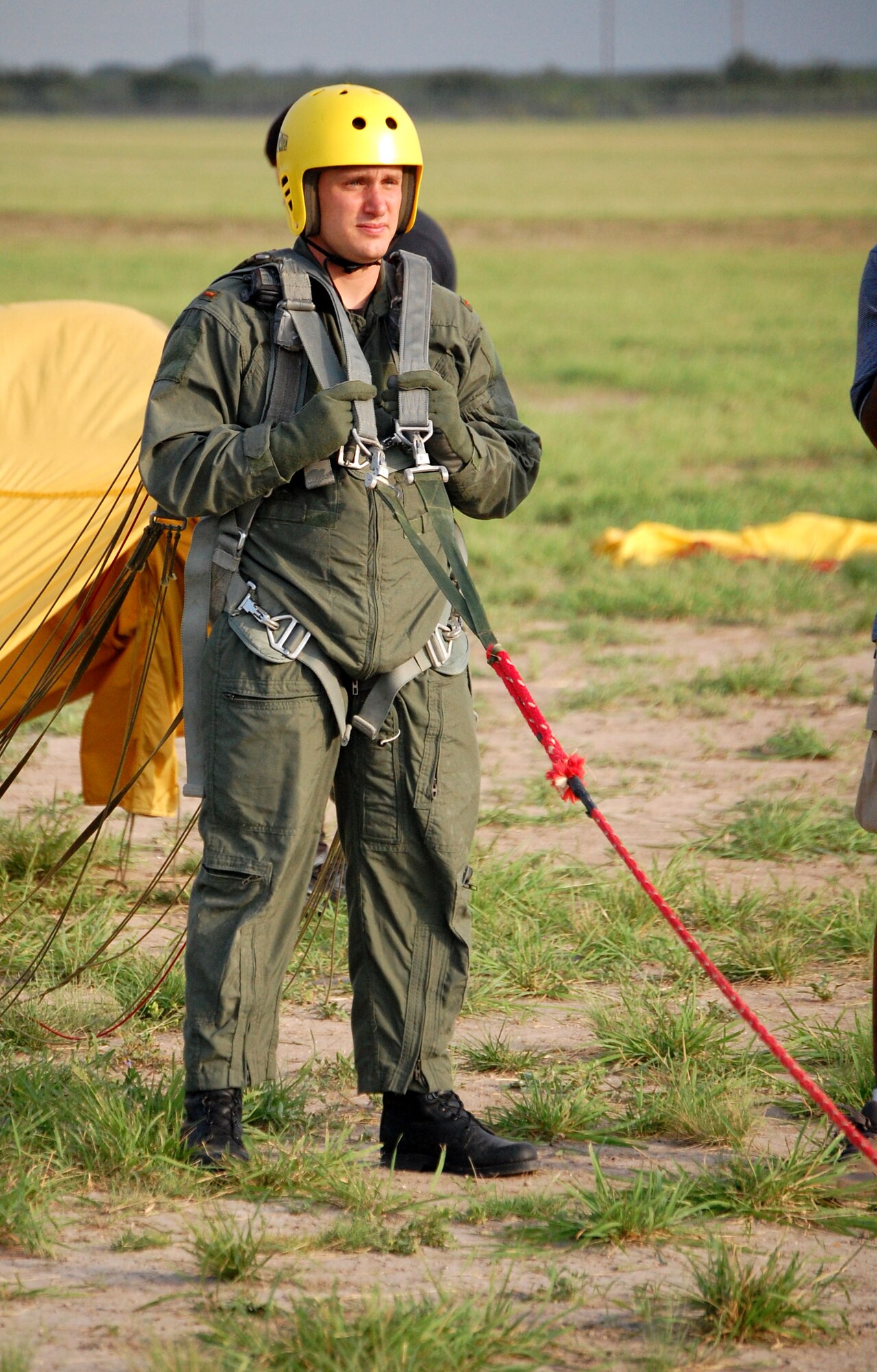 LAUGHLIN AIR FORCE BASE, Texas – Strapped in and ready to go, 2nd Lt. Seth Butler, SUPT class 08-11, waits to be pulled skyward during parachute training with Laughlin’s Aerospace Physiology Flight June 19.  (U.S. Air Force photo by Airman Sara Csurilla)