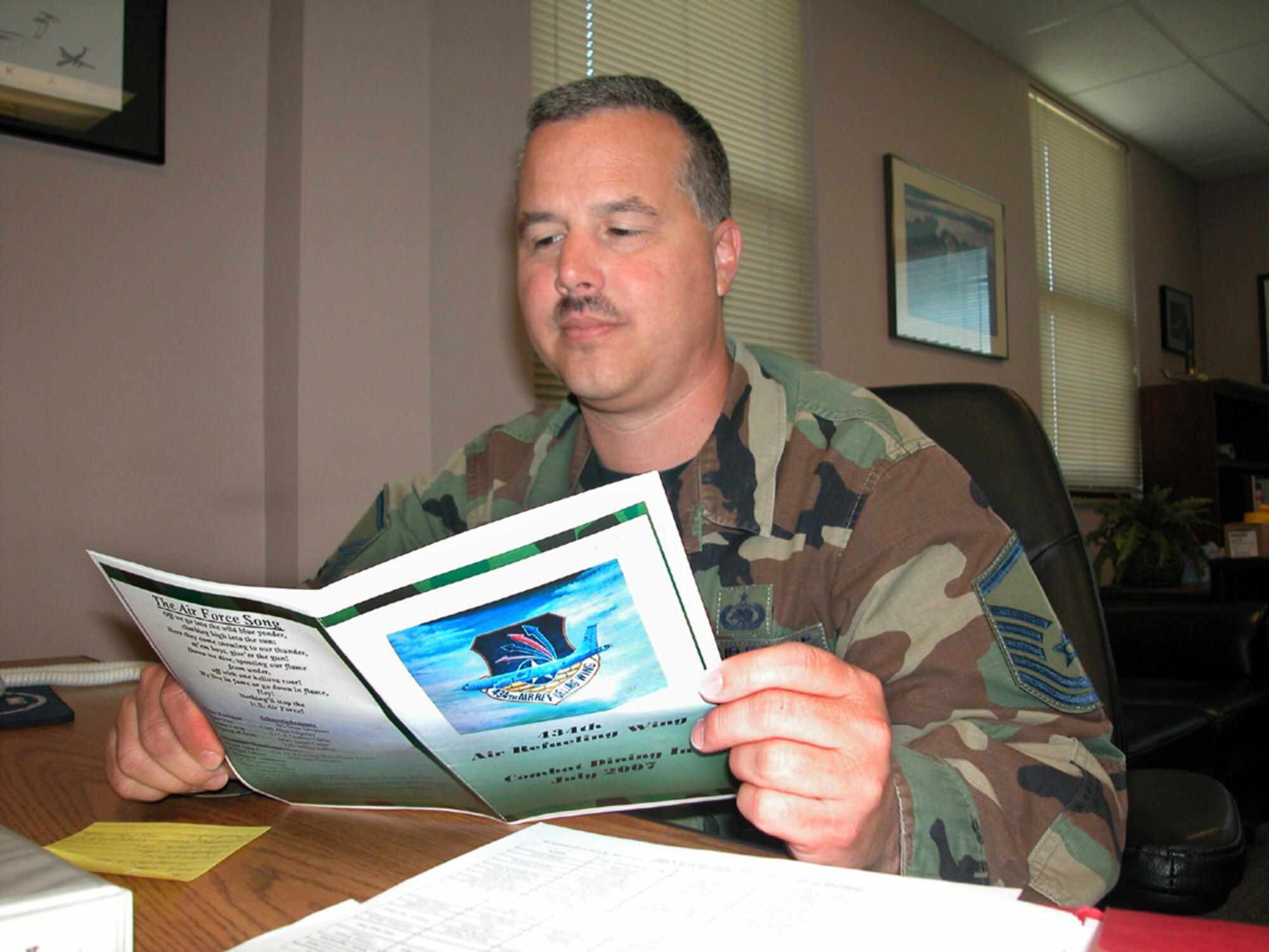GRISSOM AIR RESERVE BASE, Ind., -- Master Sgt. Scott Shives, a communications specialist with the 434th Communications Squadron, reviews the rules of engagement for the upcoming Combat Dining In.  This is the first year for Grissom to conduct an event such as this one. (Air Force photo / Senior Airman Ben Mota)