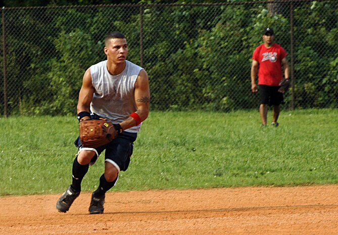 Roy Davis, Det 3, prepares to throw the ball at the first baseman.  (U.S. Air Force photo/ Staff Sgt. April Quintanilla)