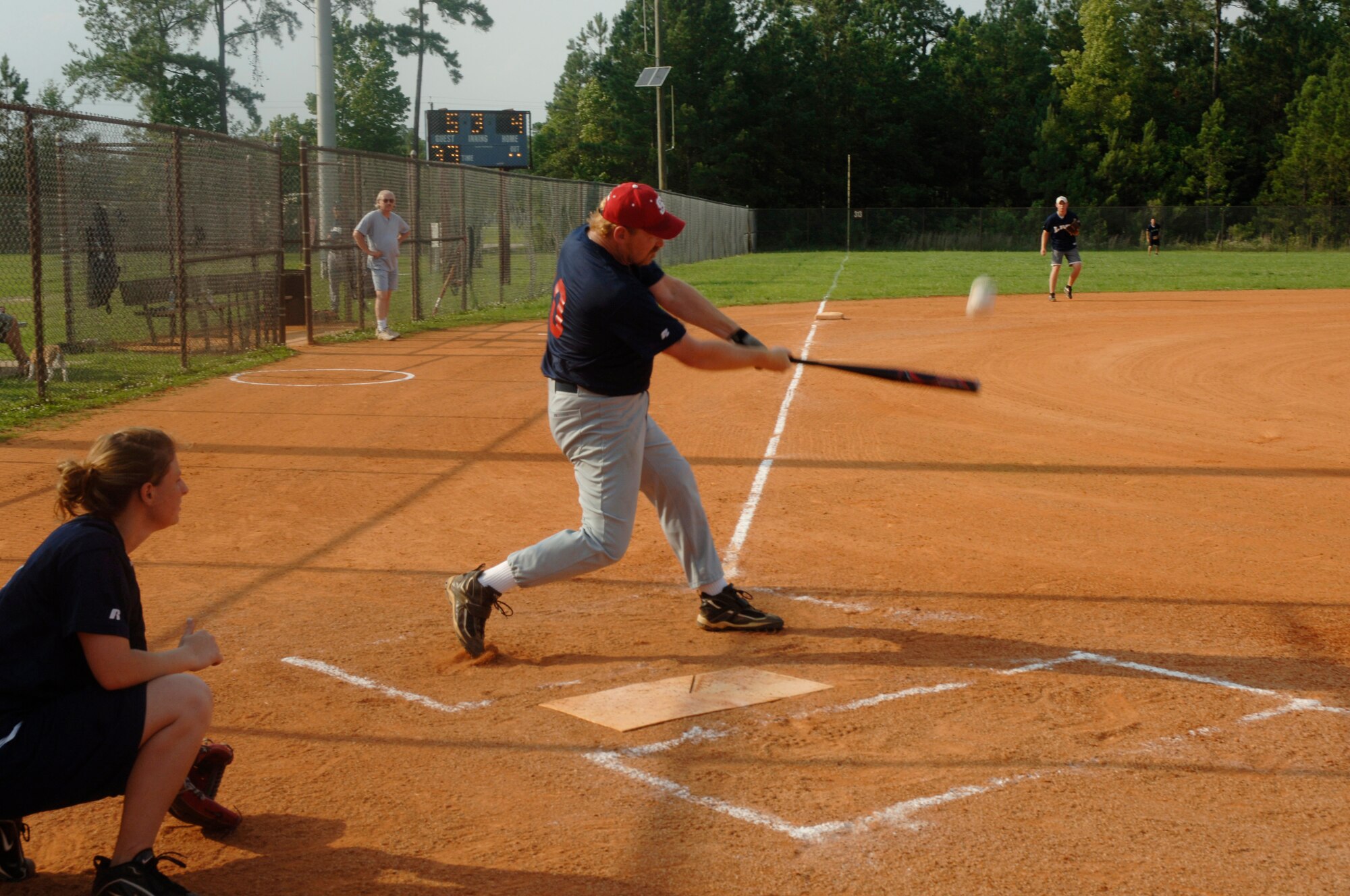 Bob Trout, 437th Security Froces Squadron, slams the ball to the outfield for a base hit.  (U.S. Air Force photo/ Staff Sgt. April Quintanilla)