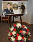 A poster of Special Agent Matthew Kuglics on display at Lackland Air Force Base's Freedom Chapel June 18 stands in tribute to his service to his country. Agent Kuglics was killed in action by an improvised explosive while supporting Operation Iraqi Freedom. (USAF photo by Robbin Cresswell)
