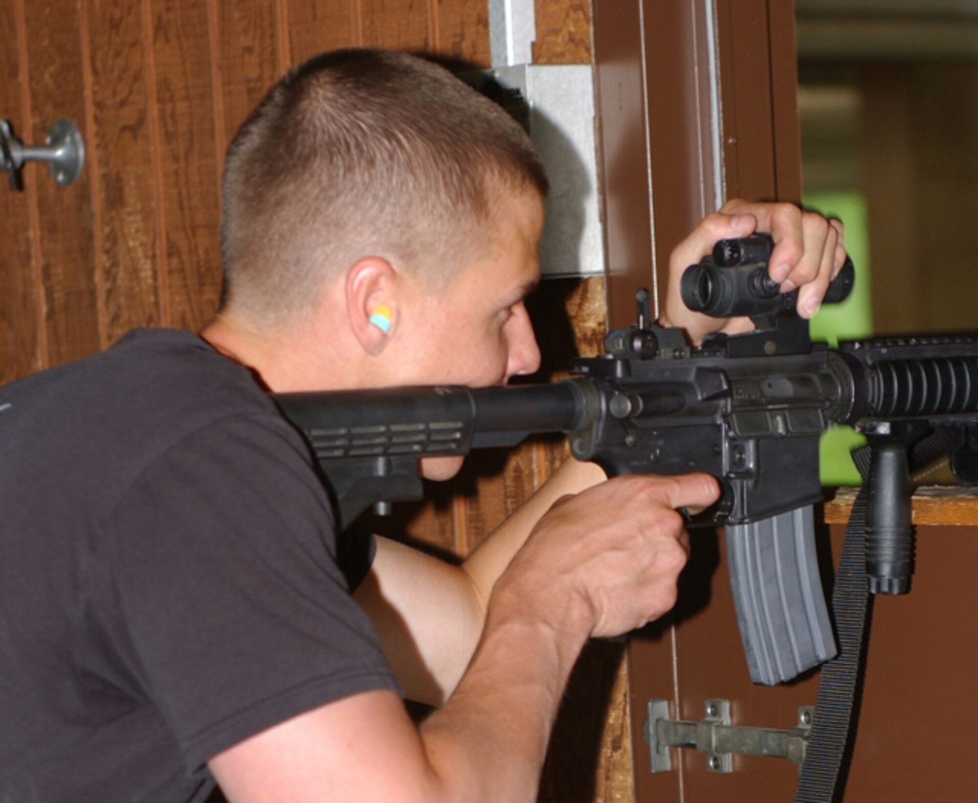 Airman 1st Class Kevin Boyle concentrates on engaging his target while preparing to compete as part of the 319th Security Forces Rodeo team at this year’s Air Mobility Rodeo competition. Airman Boyle joins Staff Sgt. Jarod Cappon and Airman 1st Class Kurt Petrowske as the three-member security forces team. (U.S. Air Force photo/Staff Sgt. Amanda Callahan)


