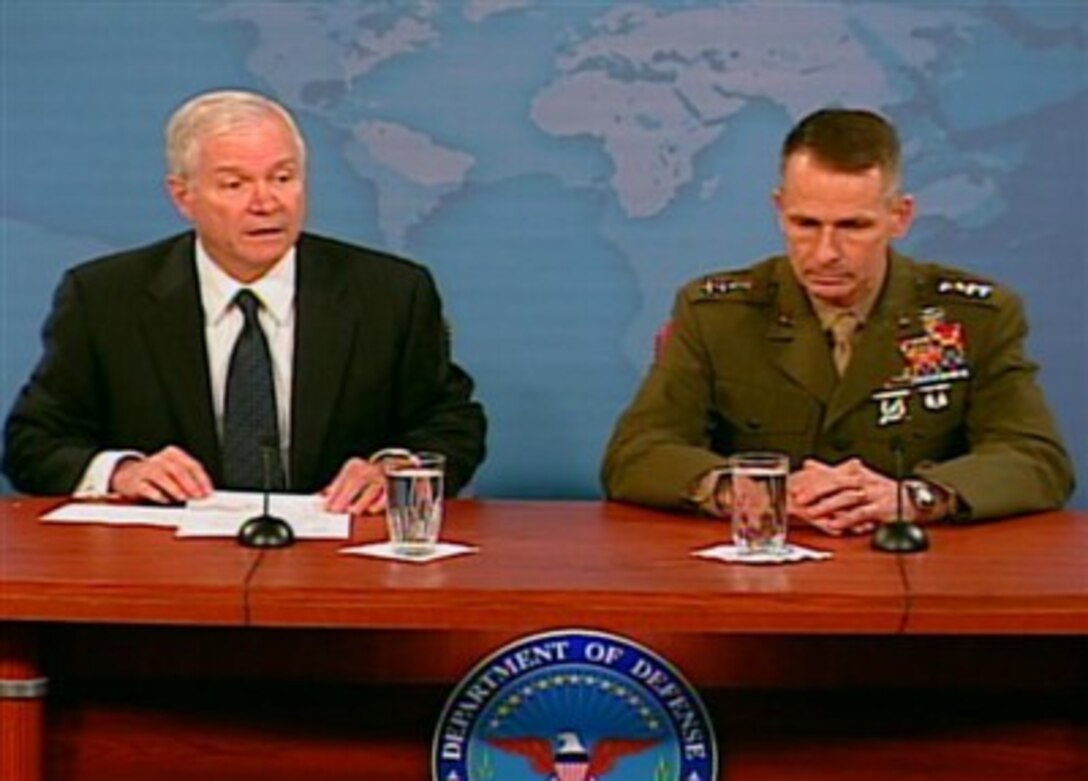Defense Secretary Robert M. Gates and Chairman of the Joint Chiefs of Staff U.S. Marine Gen. Peter Pace talk with the Pentagon press corps, June 21, 2007.