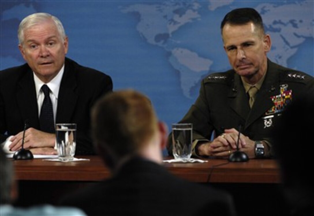 Defense Secretary Robert M. Gates and U.S. Marine Gen. Peter Pace, chairman of the Joint Chiefs of Staff, conduct a press conference at the Pentagon, June 21, 2007.  