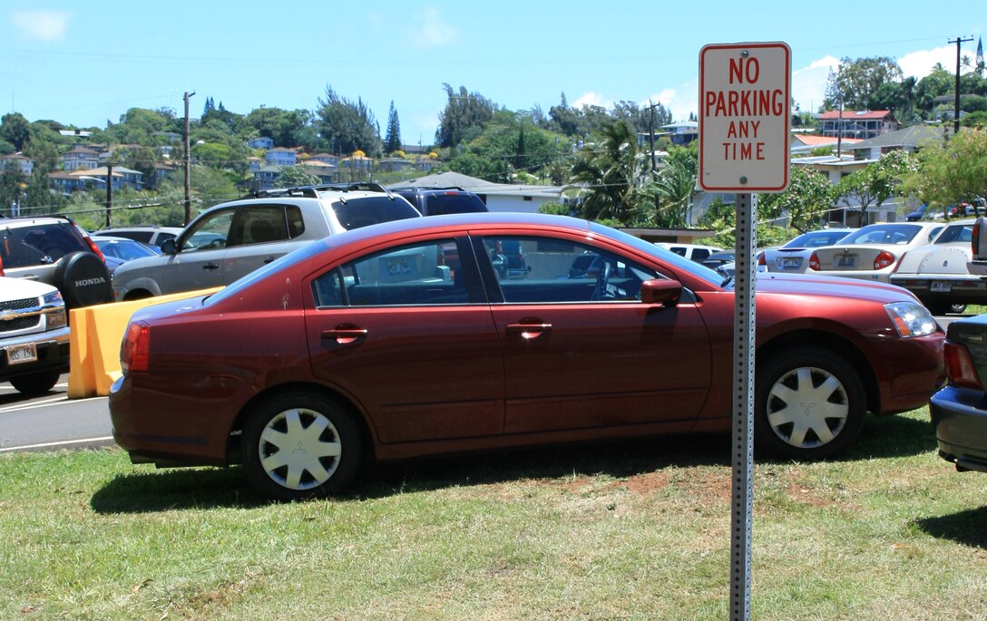 MARINE CORPS BASE CAMP H.M. SMITH, Hawaii - The recent demolition, construction and renovation projects of the headquarters building here has put a strain on near by parking spaces, so service members have begun parking illegally to avoid long walks up and down hills to work every morning.