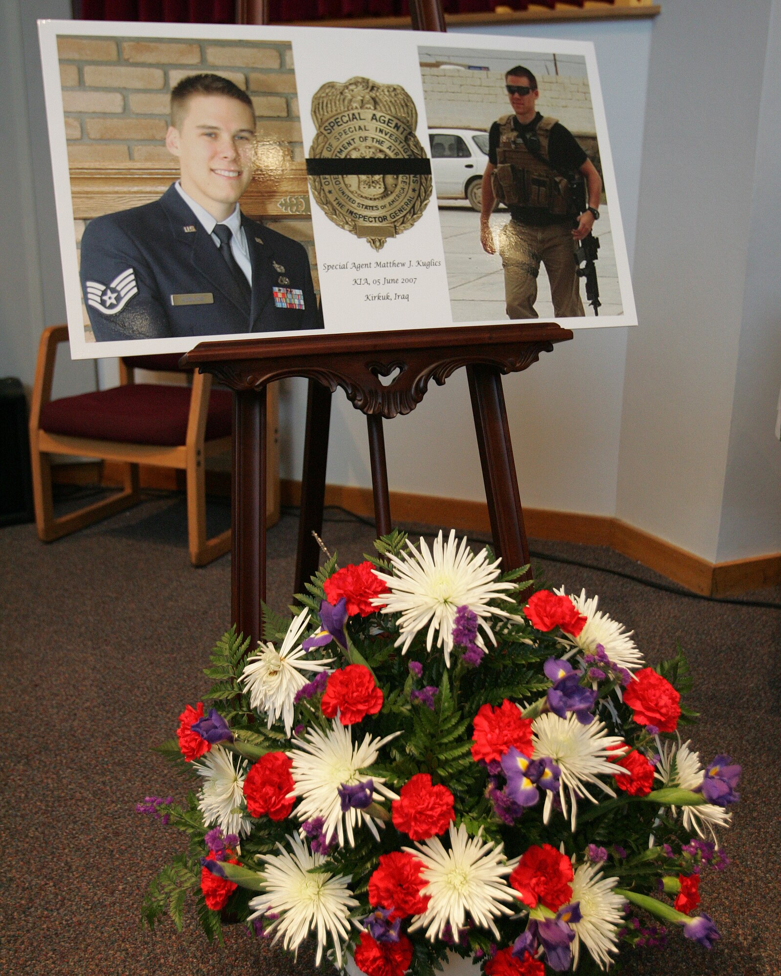 A poster of Special Agent Matthew Kuglics on display at Lackland Air Force Base's Freedom Chapel June 18 stands in tribute to his service to his country. Agent Kuglics was killed in action by an improvised explosive while supporting Operation Iraqi Freedom. (U.S. Air Force photo/Robbin Cresswell)