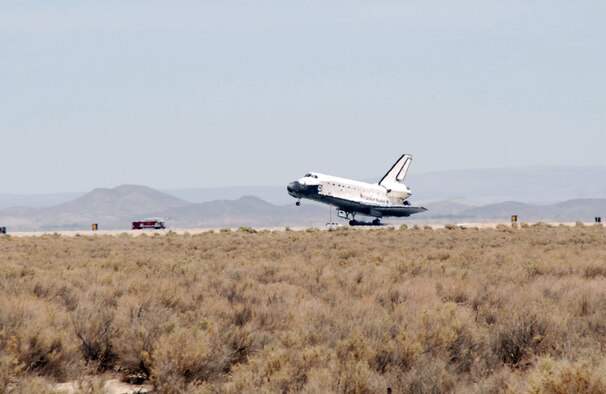 Space Shuttle Atlantis, STS-117, performs a successful landing at Edwards Air Force Base, Calif., on June 22. The shuttle started its mission June 8 to perform maintenance on the International Space Station.  STS-117 was the 21st mission to the space station and the 118th shuttle mission overall.  The Atlantis landing marks Edwards' 51st shuttle landing. The next shuttle mission is scheduled to launch in August.  (U.S. Air Force photo/Airman Mike Young)