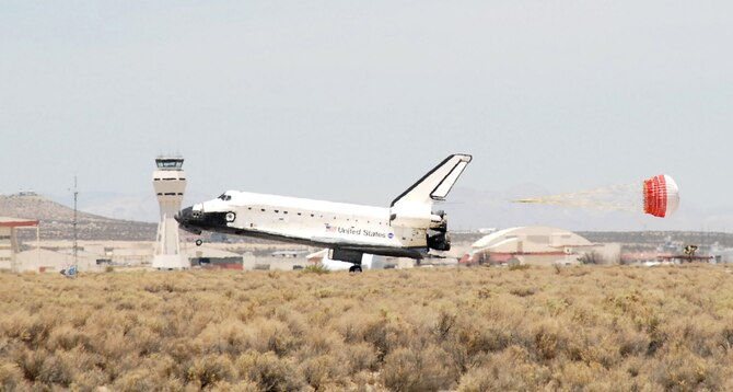 Space Shuttle Atlantis, STS-117, performs a successful landing at Edwards Air Force Base, Calif., on June 22.  The shuttle started its mission June 8 to perform maintenance on the International Space Station.  STS-117 was the 21st mission to the space station and the 118th shuttle mission overall.  The Atlantis landing marks Edwards' 51st shuttle landing. The next shuttle mission is scheduled to launch in August.  (U.S. Air Force photo/Senior Airman Jason Hernandez)