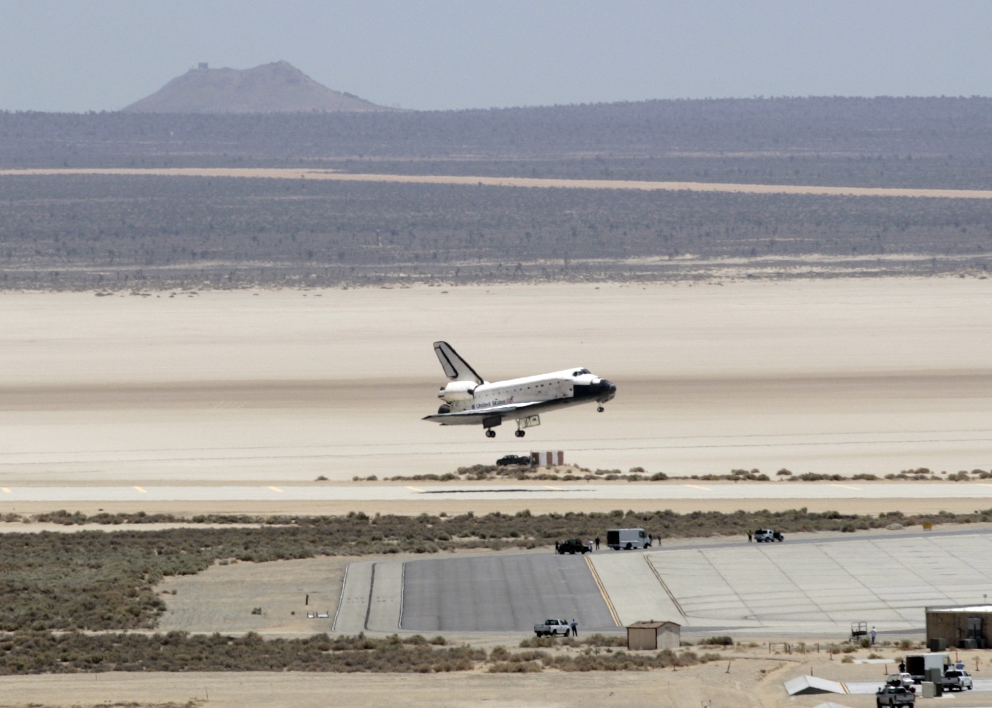 Space Shuttle Atlantis, STS-117, performs a successful landing at Edwards Air Force Base, Calif., on June 22.  The shuttle started its mission June 8 to perform maintenance on the International Space Station.  STS-117 was the 21st mission to the space station and the 118th shuttle mission overall.  The Atlantis landing marks Edwards' 51st shuttle landing. The next shuttle mission is scheduled to launch in August.  (U.S. Air Force photo/Steve Zapka)