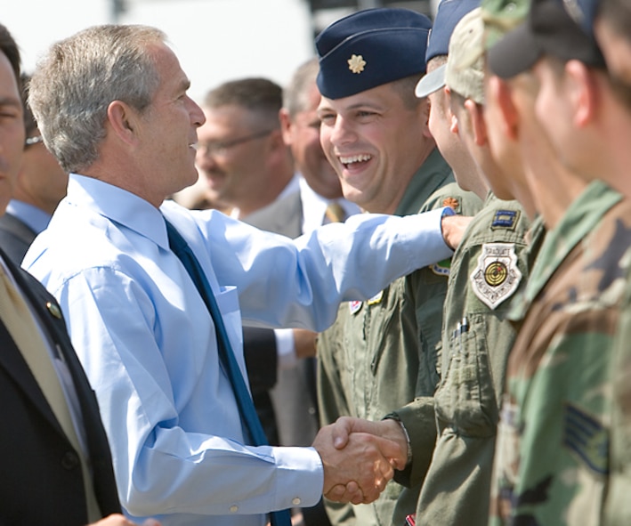 Maj. Dan Giacomazza, 5th Operation Support Squadron, along with several Minot Air Force Base Airmen met President George Bush as he visited Boeing Co.'s Integrated Defense Systems facility June 15, Wichita, Kansas.  The Airmen flew a B-52H Stratofortress to Kansas so Boeing Co. engineers could get a hands-on look at a B-52H in preparation for a modernization program slated for this fall. (Courtesy photo)