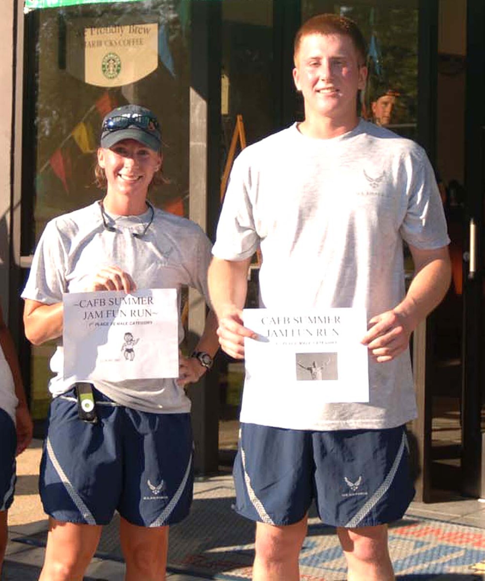 Captain Kristi Contardo, 14th Operations Support Squadron, was the first place female runner in the Summer Jam Fun Run Friday morning at the Fitness Center. Airman 1st Class Seth Skrypek, 14th OSS, was the first place male runner. (U.S. Air Force Photo by Airman 1st Class Danielle Powell)
