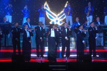 MINOT AIR FORCE BASE, N.D. -- Tops in Blue members close out events on a high note during a concert at the Minot Municipal Auditorium June 21. Tops in Blue is the premier Air Force entertainment showcase. The concert was free and open to the public. This year's performance was entitled "The Fly By" highlighting the 60th anniversary of the Air Force. Tops in Blue's mission is to serve as an expeditionary entertainment unit providing quality entertainment to Airmen stationed worldwide at remote and deployed locations while simultaneously promoting community relations, supporting recruiting efforts and serving as ambassadors for the U.S. and the U.S. Air Force. (U.S. Air Force photo by Airman 1st Class Joe Rivera)