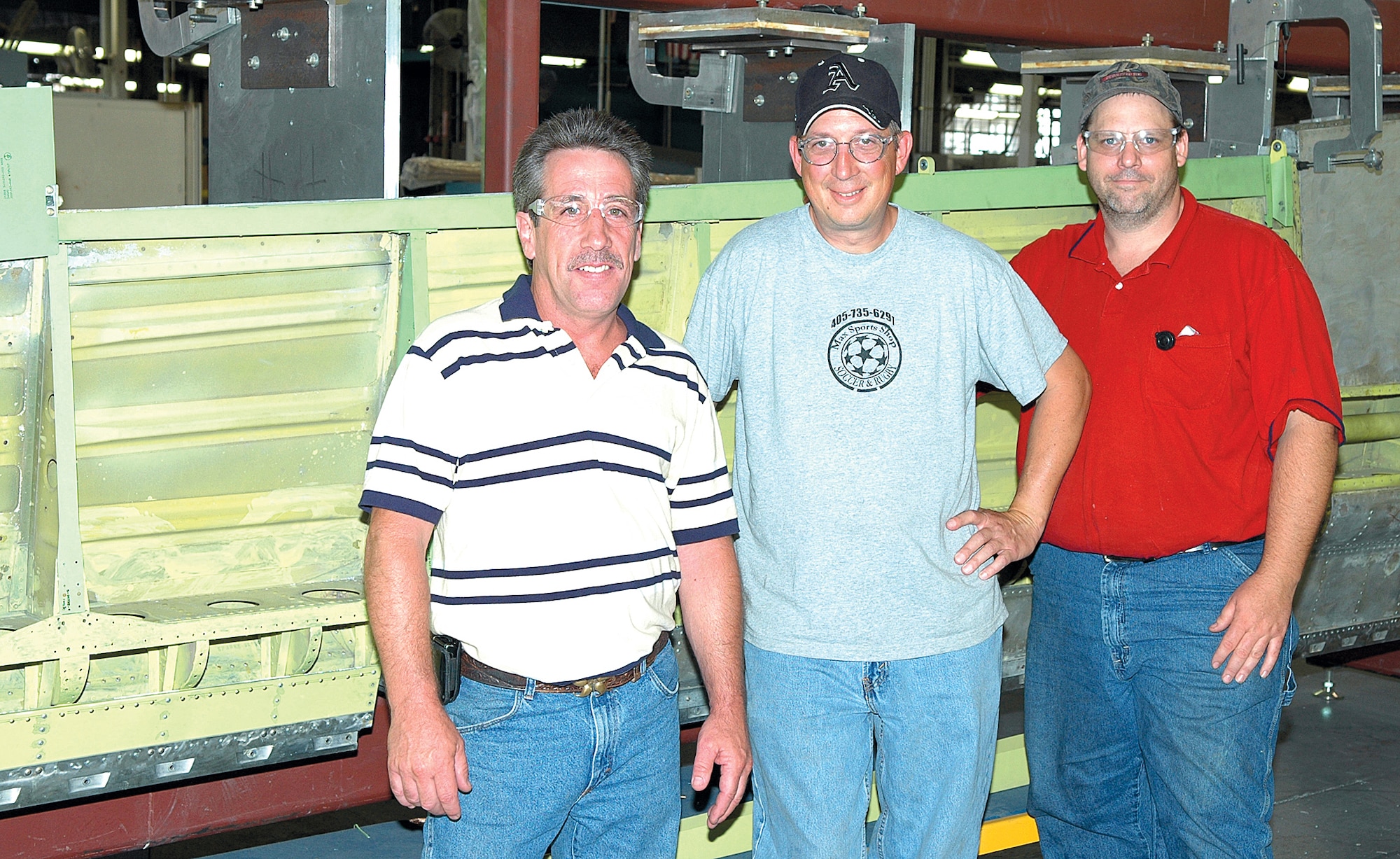 Randy Roy,  Russell Anderson and Timothy Miller, from left, found a fix for KC-135 elevators that kept the fleet in the air and put extra cash in their pockets through the IDEA program. (Air Force photo by Brandice J. Armstrong)
