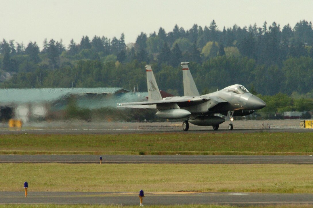 A U.S. Air Force F-15C Eagle aircraft lands at Portland Air National Guard Base, Ore., May 5, 2007, as part of the 142nd Fighter Wings conversion from A/B models to C/D models.  (U.S. Air Force photo by Senior Airman John Hughel, jr.)  (Released   