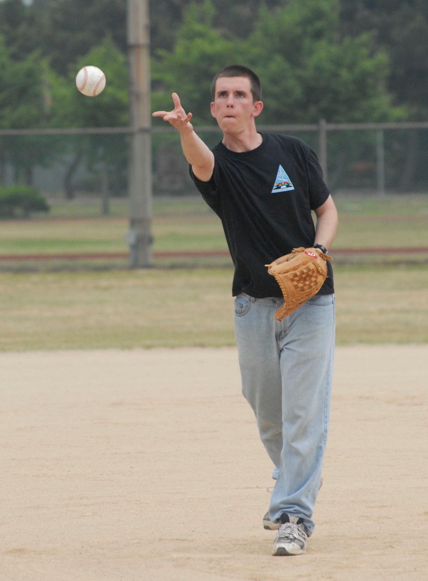 KUNSAN AIR BASE, Republic of Korea -- Cadet Jesse Lind, from the U.S. Air Force Academy, throws a pitch during a softball game here June 21.  (U.S. Air Force photo/Staff Sgt. Darcie Ibidapo)
