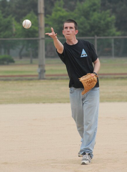 KUNSAN AIR BASE, Republic of Korea -- Cadet Jesse Lind, from the U.S. Air Force Academy, throws a pitch during a softball game here June 21.  (U.S. Air Force photo/Staff Sgt. Darcie Ibidapo)
