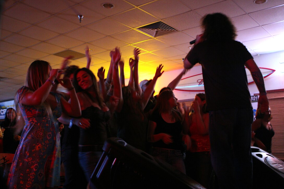 Drew Spenser, singer from Analog, rocks the crowd at Battle of the Bands Friday at Kahunas.