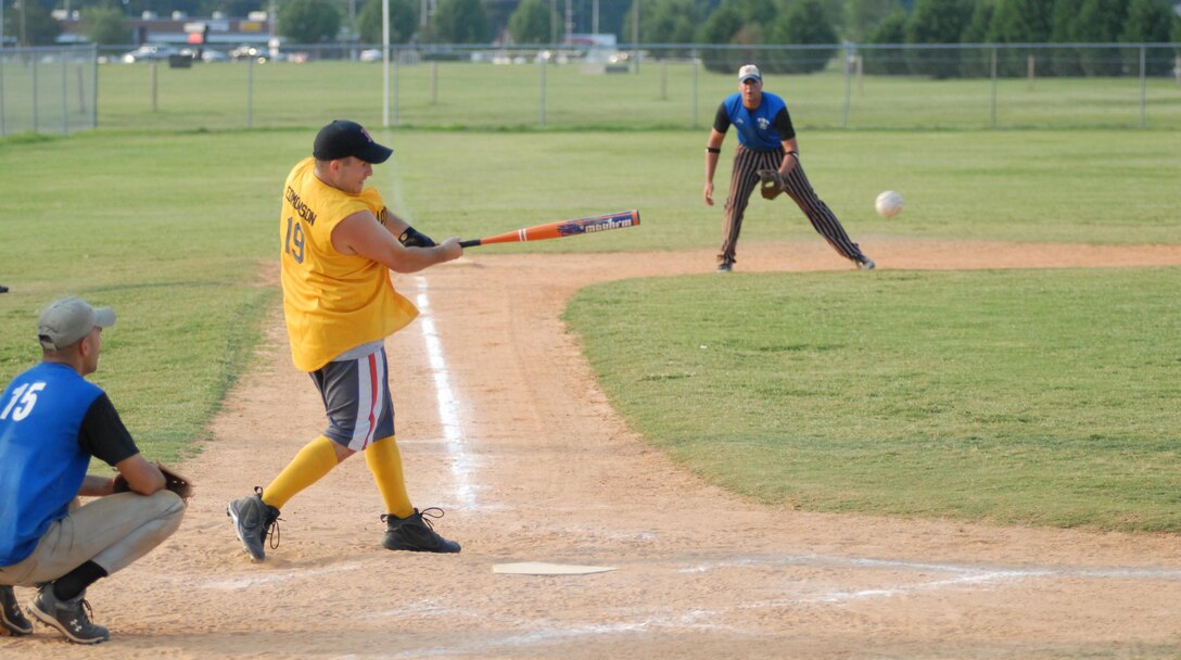 MARINE CORPS BASE CAMP LEJEUNE, N.C. ? Naval Hospital Camp Lejeune?s William Edmonson connects with a pitch in one of the early rounds of Midnight Madness softball tournament.