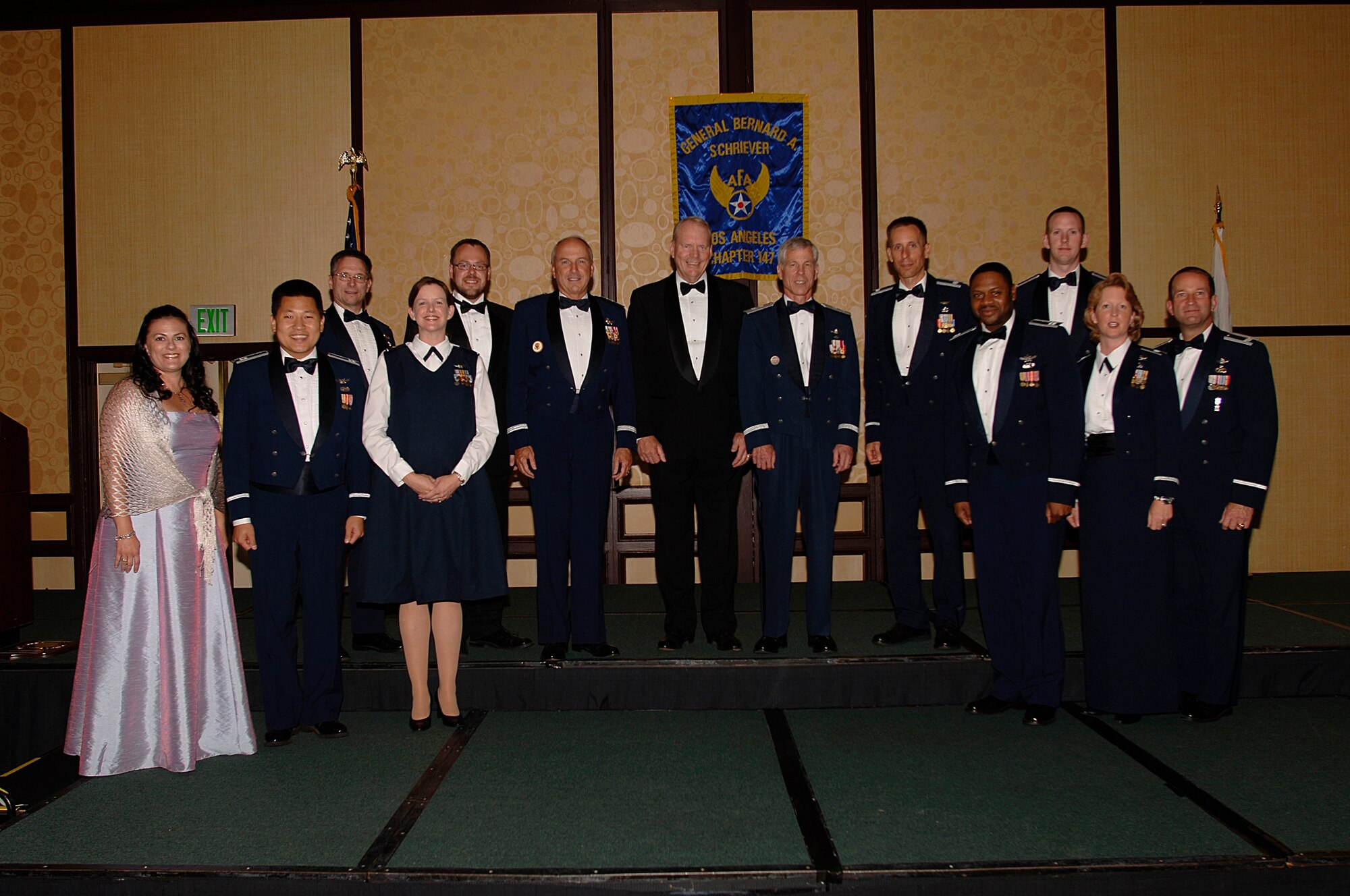 AFA's General Bernard A. Schreiver Chapter honored 147 outstanding SMC personnel at its annual Salute to SMC Banquet, June 22. Pictured from left to right are Stacy Dumas, Capt. Daniel Lim, Col. Randall Weidenheimer, Maj. Jennifer van Weezendonk, Brice Barrett, Lt. Gen. Michael Hamel, Retired Lt. Gen. Brian Arnold, Maj. Gen. William Shelton, Lt. Col. William Berkstresser, Capt. Donny White, 1st Lt. Alex White,  Lt. Col. Donna Shipton and Col. Wesley Ballenger. Other winners not pictured include: Capt. Donita Ruehs, TSgt. Travis Chenard, SrA Ashley Borja and Barbara Konieczny