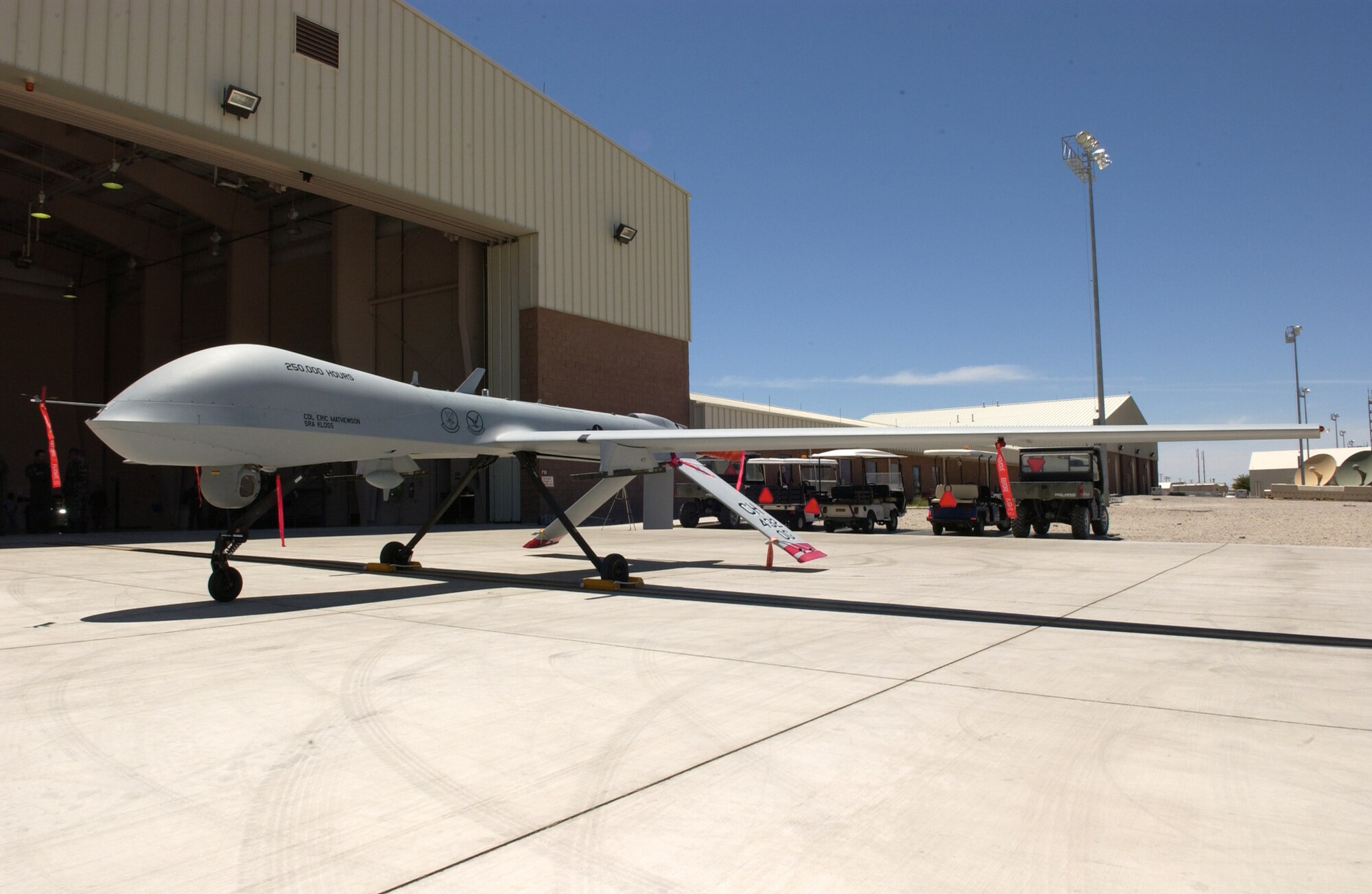 The MQ-1 Predator sits on display after commemorating the 250,000th flight hour June 22, 2007, at Creech Air Force Base, Nev. The MQ-1 Predator is assigned to the 11th Reconnaissance Squadron at Creech. (U.S Air Force Photo by Senior Airman Larry E. Reid Jr.)                              