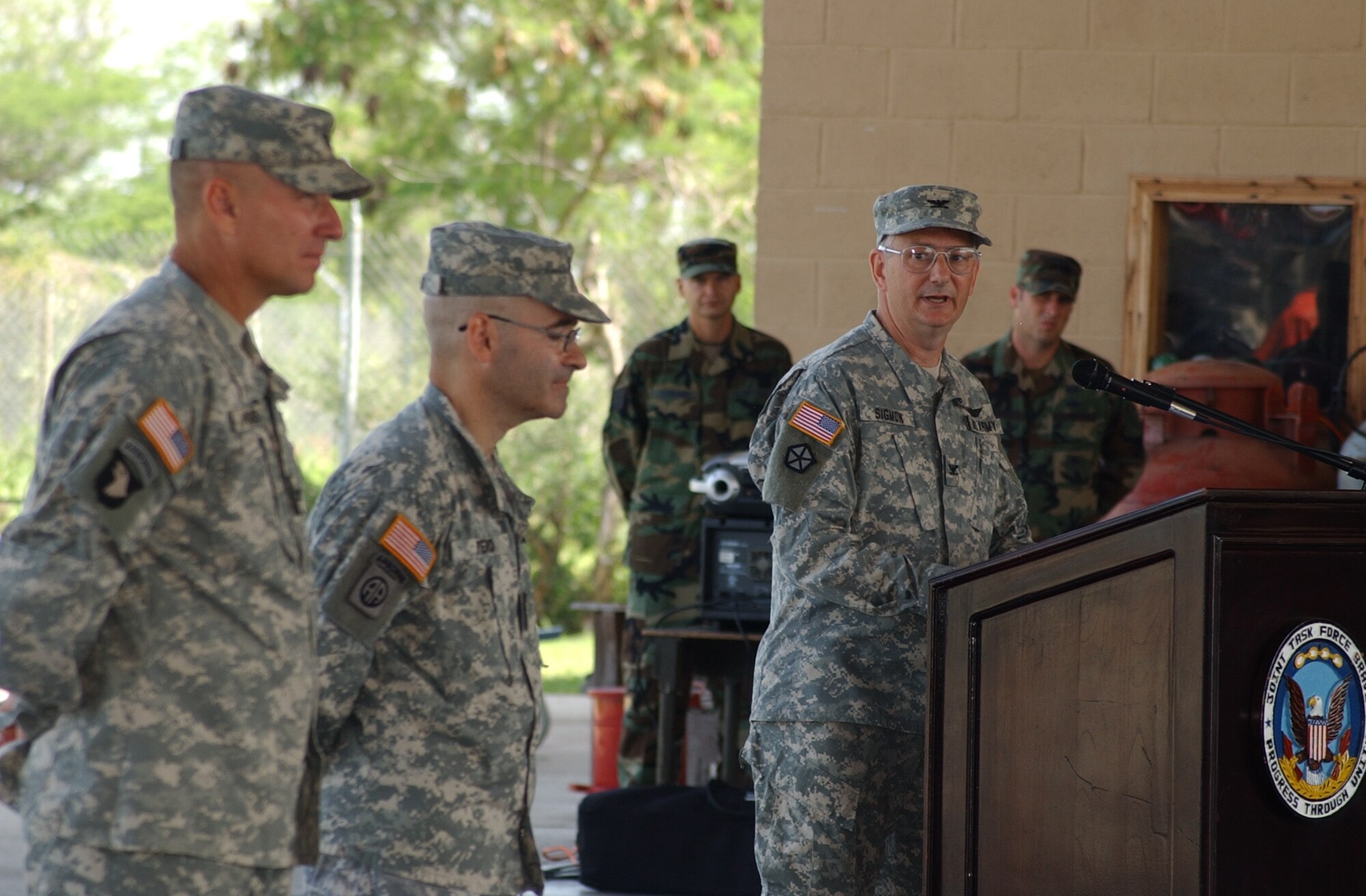 After taking command of the Joint Task Force-Bravo Medical Element here, Army Col. Michael Sigmon addressed those on hand June 25 at the Soto Cano Air Base Fire Department. Colonel Sigmond arrived from Fort Lewis where he served as a resident in preventive medicine. U.S. Air Force photo by Senior Airman Shaun Emery.