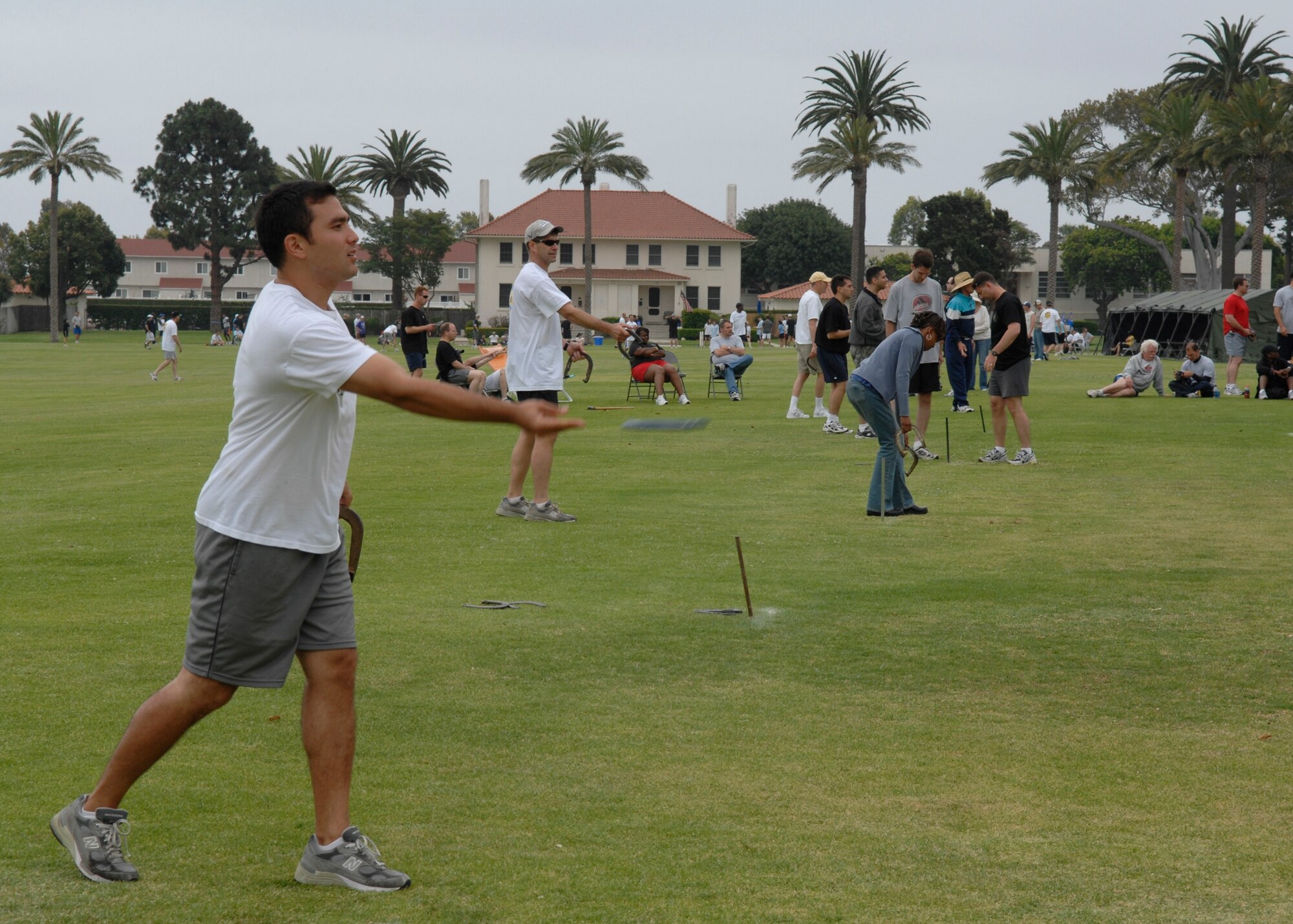 Capt. Richard Simko tosses horseshoes at the 2007 SMC Sports Day, June 15. The Space Superiority Systems Wing took the day’s overall title. (Photo by Joe Juarez)