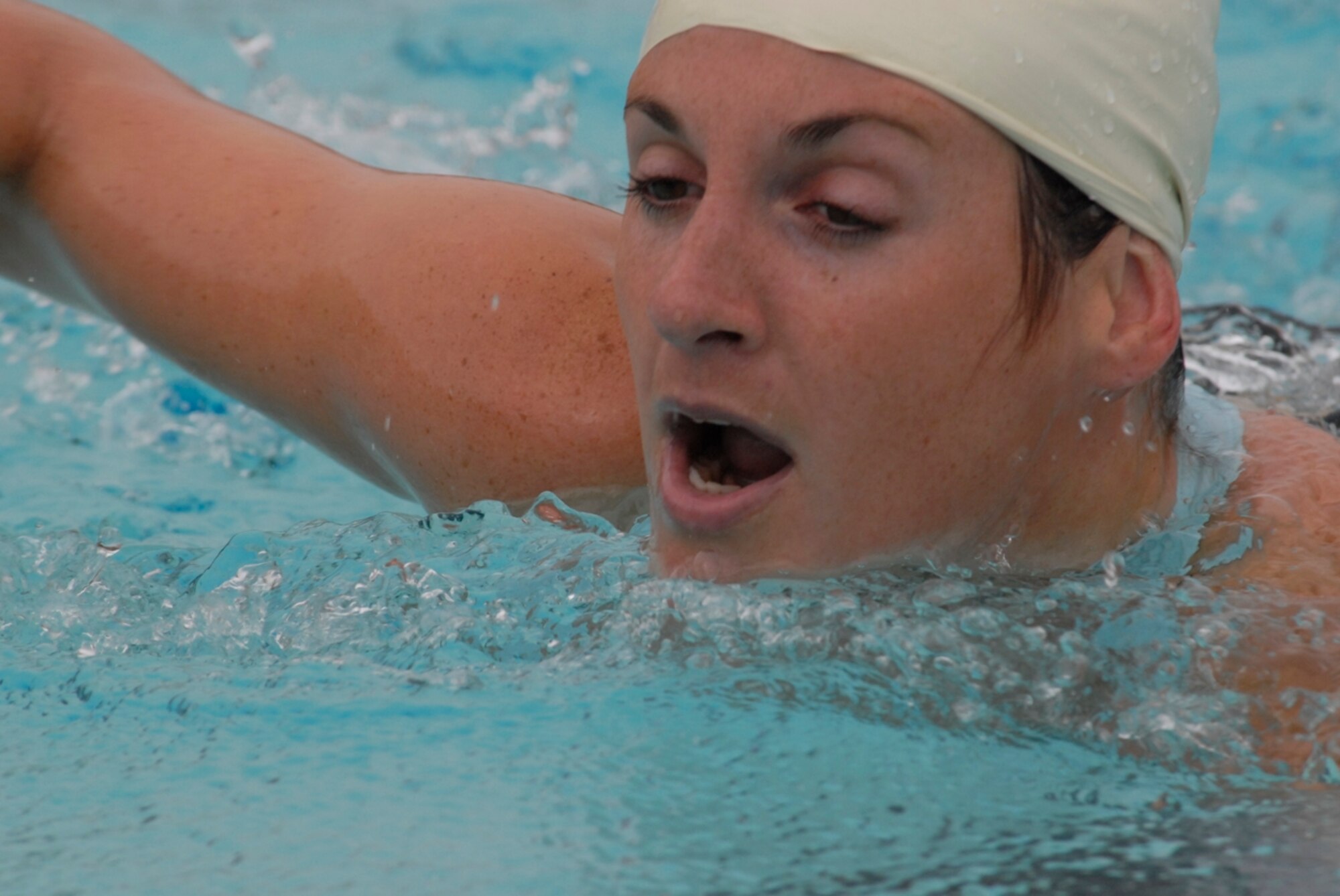 Capt. Tracie Ryan completes the 60 M swim at the 2007 SMC Sports Day, June 15. The Space Superiority Systems Wing took the day’s overall title. (Photo by Joe Juarez)