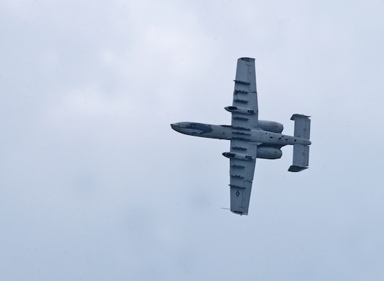 EIELSON AIR FORCE BASE, Alaska--An A-10 performs various aerobatic maneuvers during the 2007 Soaring into Solstice Open House June 23 here. More than 25,000 people attended the all-day event featuring aerial and ground demonstrations including flybys, simulated airfield attacks, and aerobatic maneuvers as well as concessions, live music and aircraft displays. (U.S. Air Force photo by Senior Airman Justin Weaver)