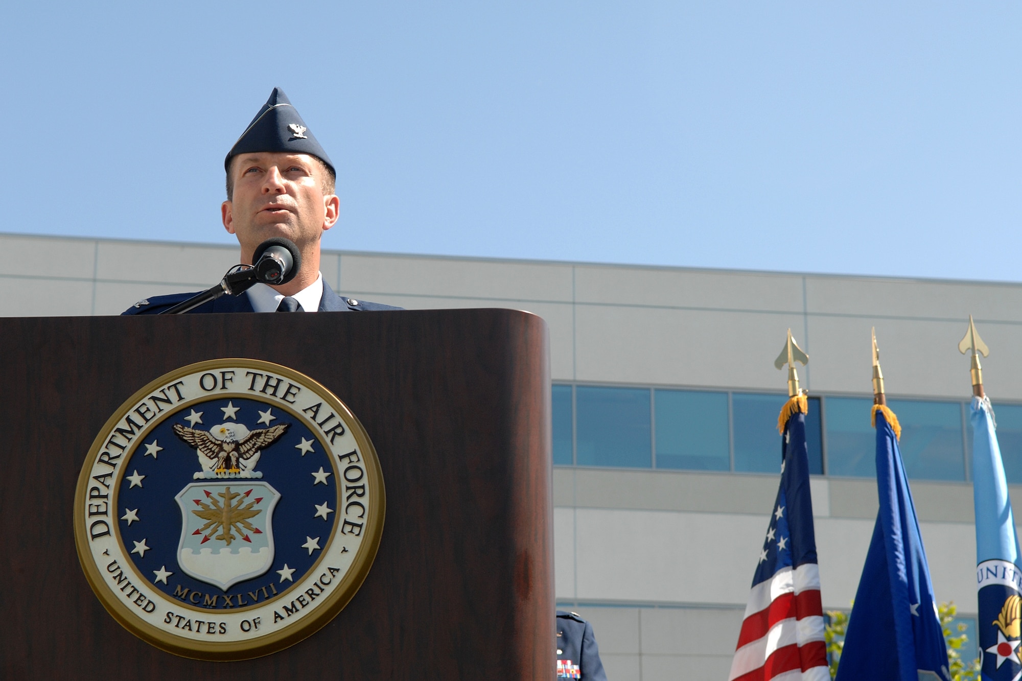 Outgoing GPS Wing Commander Col. Wesley Ballenger addresses the crowd at the wing’s change of command ceremony held June 18. Col. David Madden is the wing’s new commander. (Photo by Stephen Schester)