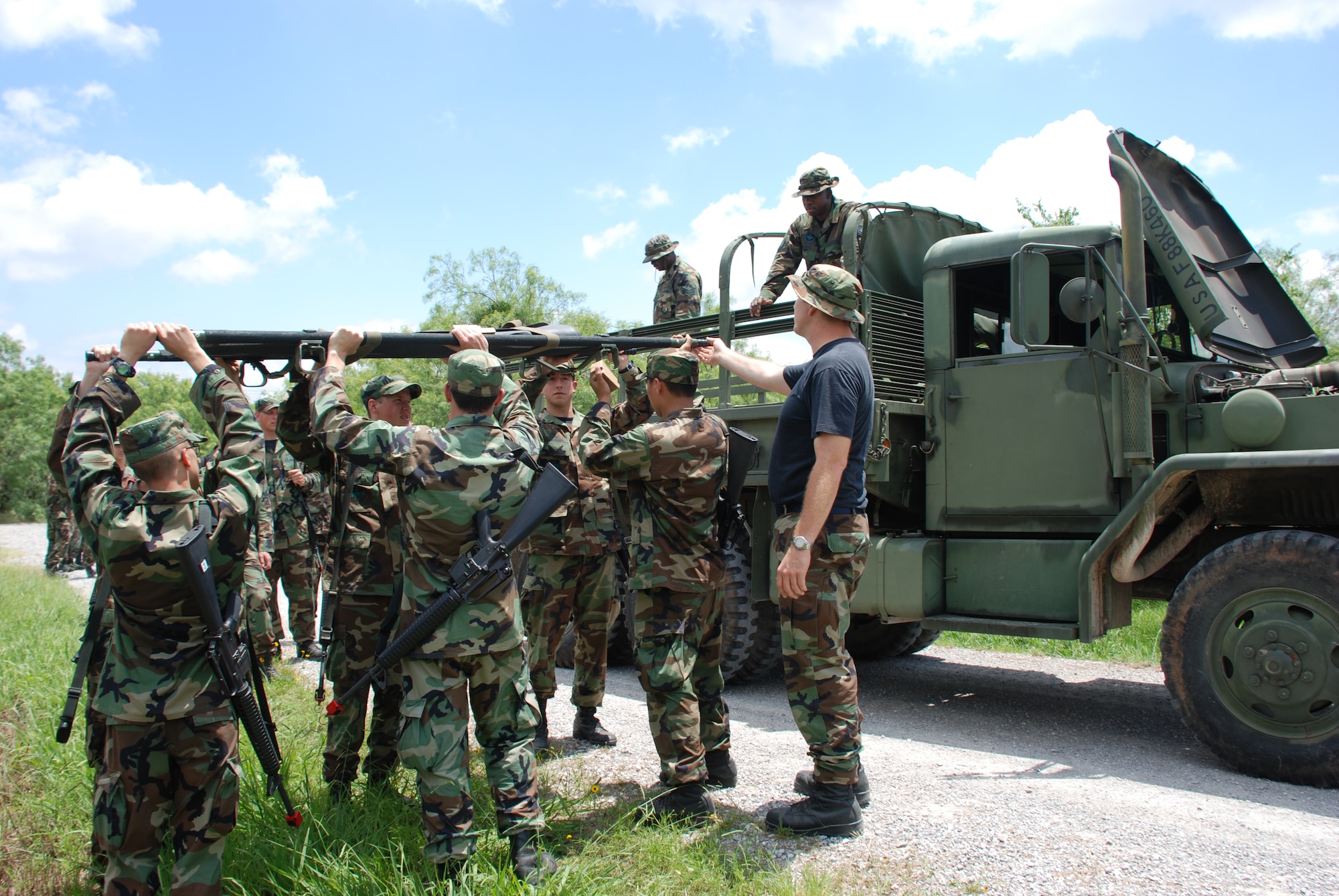 Operation Air Force cadets practice moving an injured patient during combat skills training June 8. (U.S. Air Force photo/Airman 1st Class Jacob Corbin)