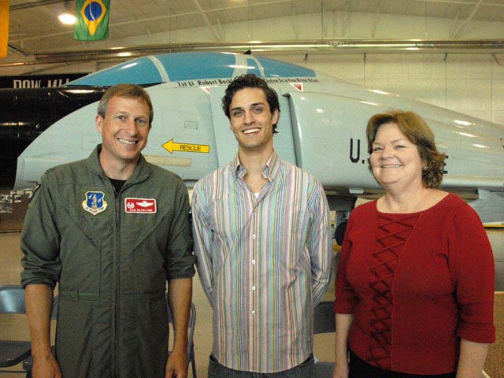 From left to right Col. Robert J. Becklund flew the F-4 that delivered the transplant heart, Andrew De La Pena is the heart recipient, and Marguerite E. Brown, RN, MSN, is a member of the team that recovered the heart.  Marguerite Brown was the Stanford University Medical Center nurse who handled the little red and white cooler with the tiny heart in it to Col. Becklund as he prepared to speed off into the night in his F-4 to California.