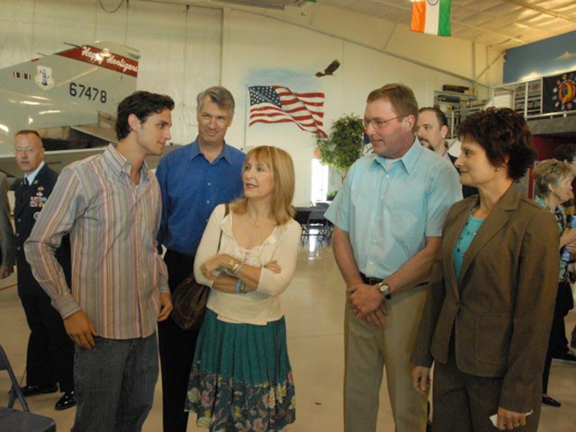 Fro left to right, heart recipient Andrew De La Pena, his father and mother Stephen De La Pena and Deborah McCarthy, visit for the first time with heart donor parents Steve and Karen McCann.