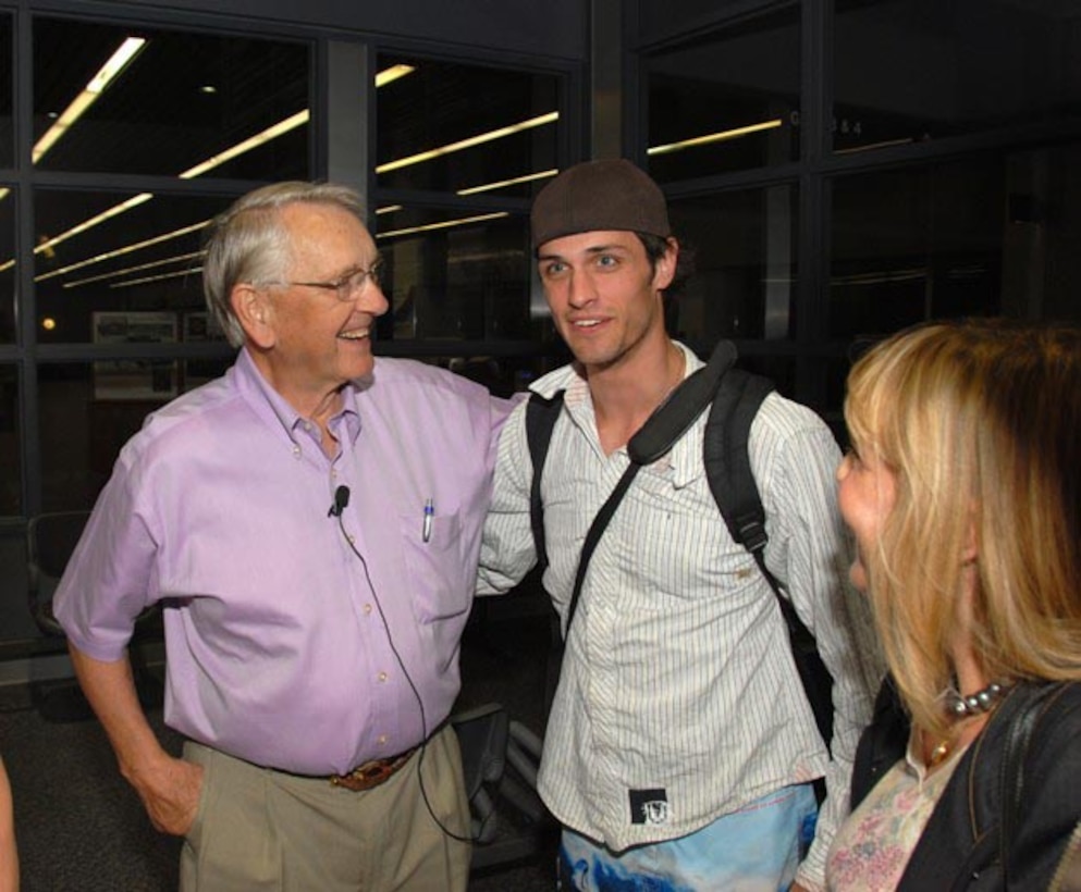 Former North Dakota governer George Sinner greets Andrew De La Pena at Hector International Airport May 13. Governer Sinner was instramental in the decision to use a North Dakota Air National Guard F-4 to transport Andre's new heart after a civilian jet which was originally designated to transport the heart had an engine failure.