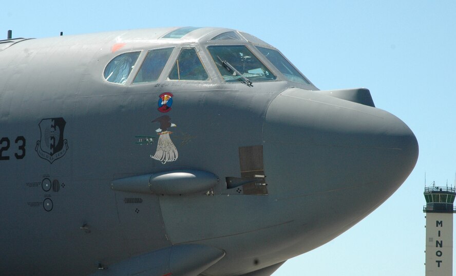 MINOT AIR FORCE BASE, N.D. -- A B-52H Stratofortress unveils its new nose art commemorating the 23rd Bomb Squadron’s 90th anniversary during a ceremony on the flight line here June 22. Originally designated the 18th Aero Squadron June 16, 1917, just six days later it was renamed the 23rd Aero Squadron and has kept that designation ever since. (U.S. Air Force photo by Senior Airman Danny Monahan) 
