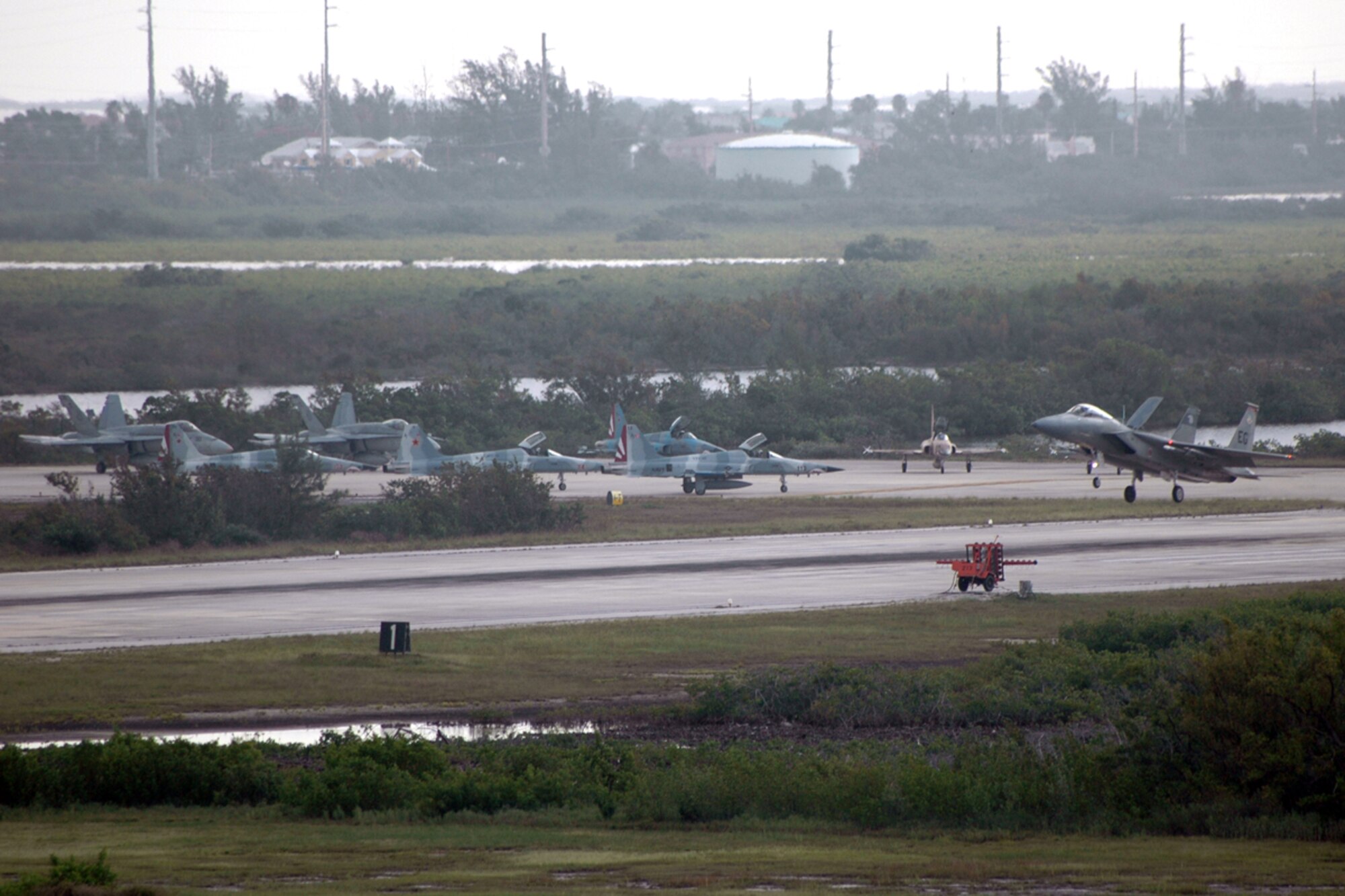 The 60th Fighter Squadron from the 33d Fighter Wing at Eglin Air Force Base, Fla., deployed 16 F-15Cs and more than 200 personnel June 15 for two weeks of dissimilar air combat training as an exercise in joint training operations with the Navy at Naval Air Station Key West, Fla. (Photo by Jenna McMullin, 33d Fighter Wing Public Affairs)