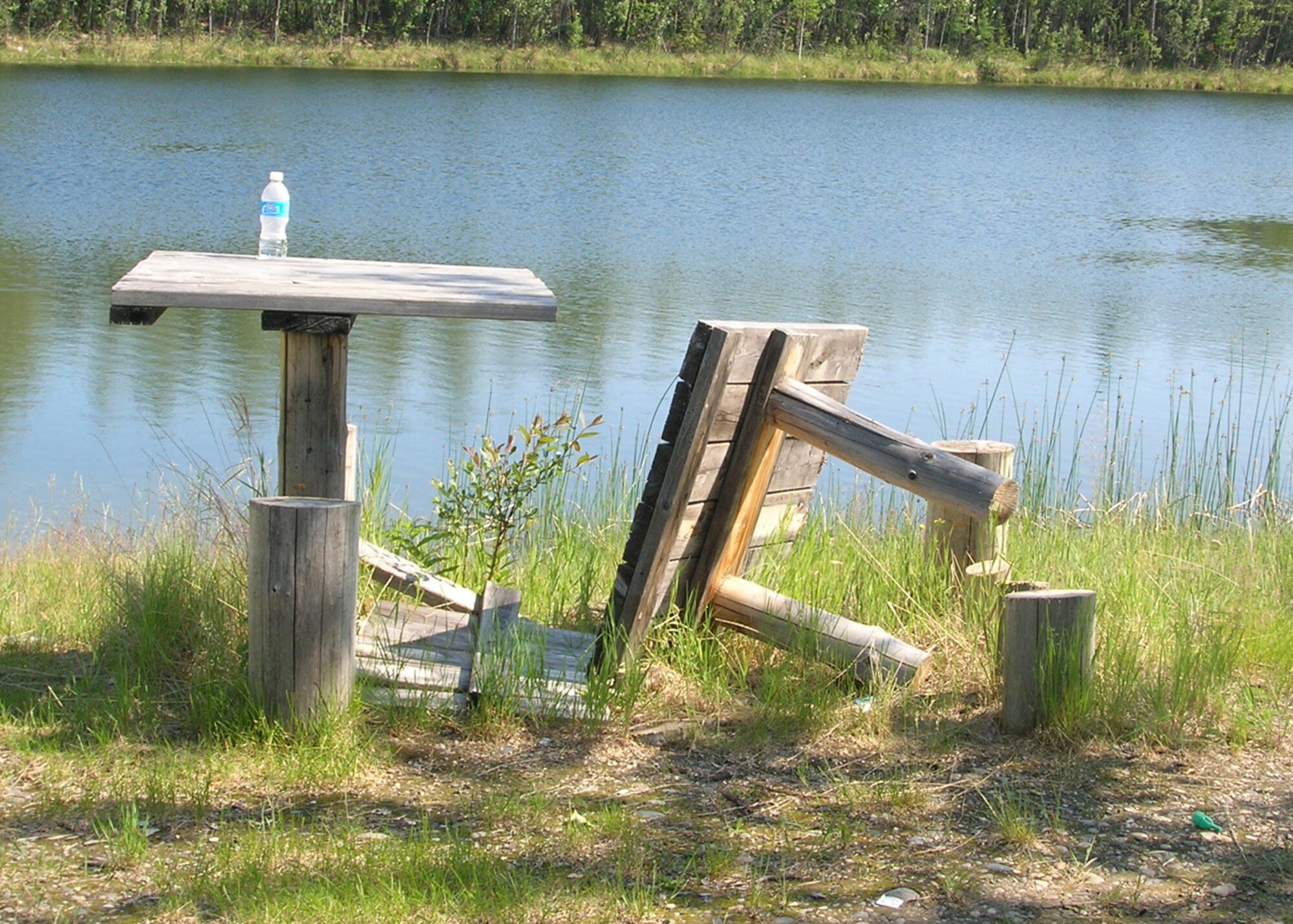 EIELSON AIR FORCE BASE, Alaska--Eielson Outdoor Recreation would like to enforce the unacceptance of vandalism of base property. On May 19 the Outdoor Recreation staff repaired three picnic tables that were ripped apart and uprighted outhouses that were tipped over. Other vandalism has also been observed, such as four out of seven tables were destroyed at an on-base picnic sight; parts were burned in a fire pit, cut up with a chain saw and some parts just disapeared. The Natural Resources office is in charge of maintaining sites, but find it challenging due to shortage of staff. To report vandalism please call the law enforcement desk at 377-5130.