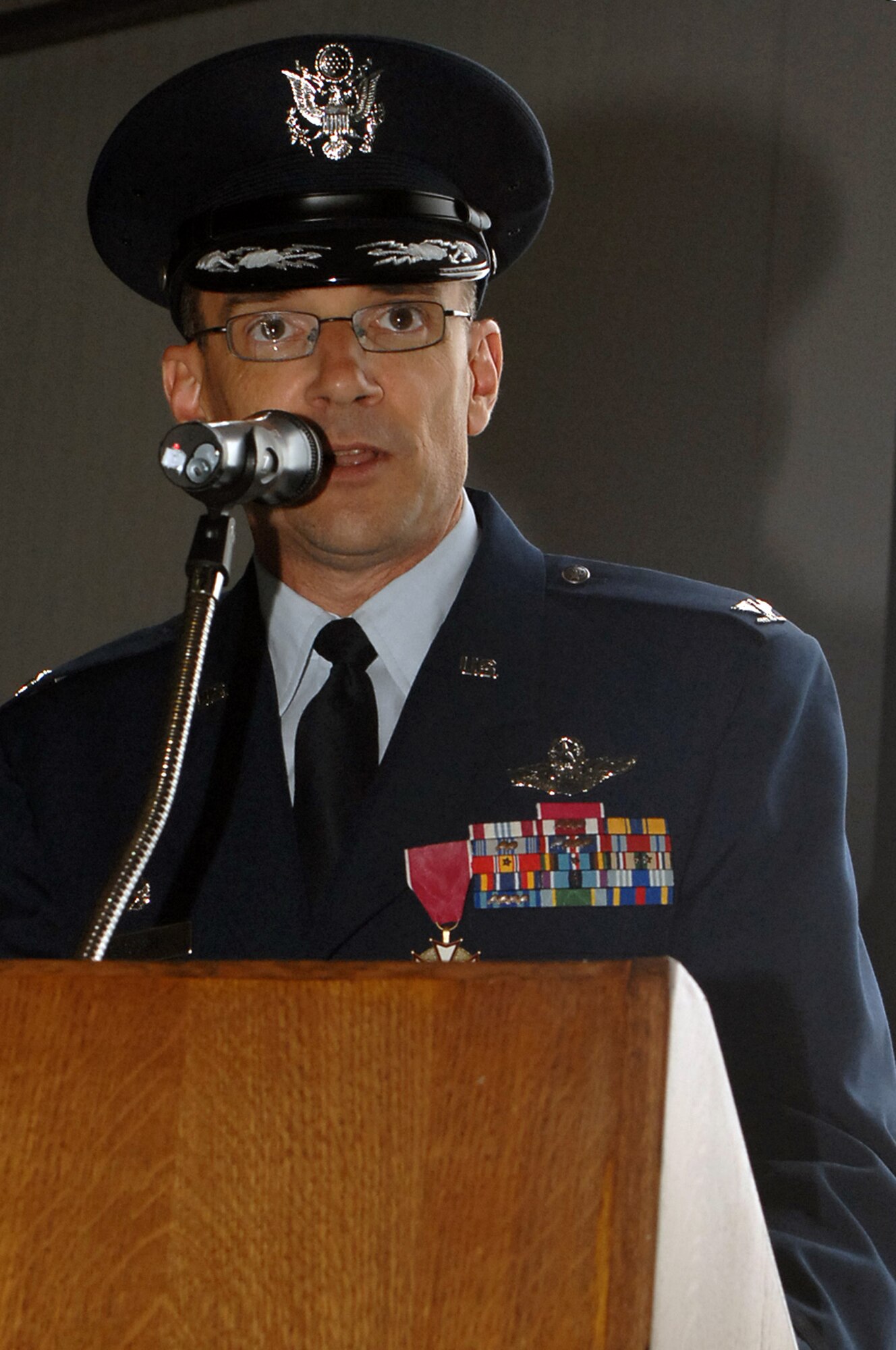 Col. Michael S. Stough speaks to members of Team Mildenhall during the 100th Air Refueling Wing change of command June 22. Colonel Stough departed RAF Mildenhall to become the Chief, Global Mobility Division, HQ USAF, Pentagon, Va. 

