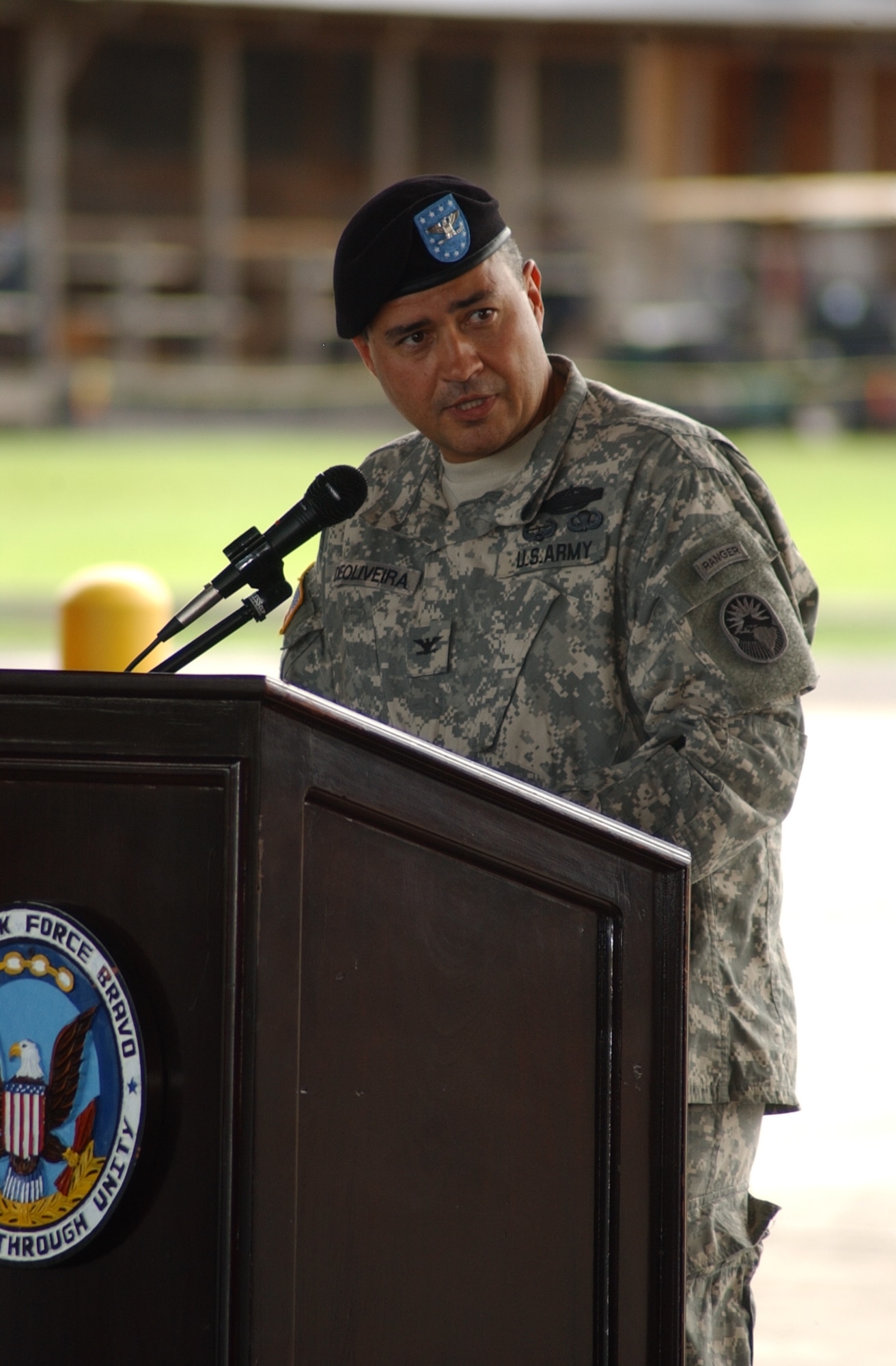 Army Col. Marcus DeOliveira, addresses members of Joint Task Force Bravo during the JTF-Bravo change of command ceremony at the Soto Cano Air Base Fire Station June 27. U.S. Air Force photo by Martin Chahin.