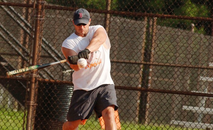Ed Ebersole, 437 OSS, swings at the ball. (U.S. Air Force photo/Airman 1st Class Nicholas Pilch) 
