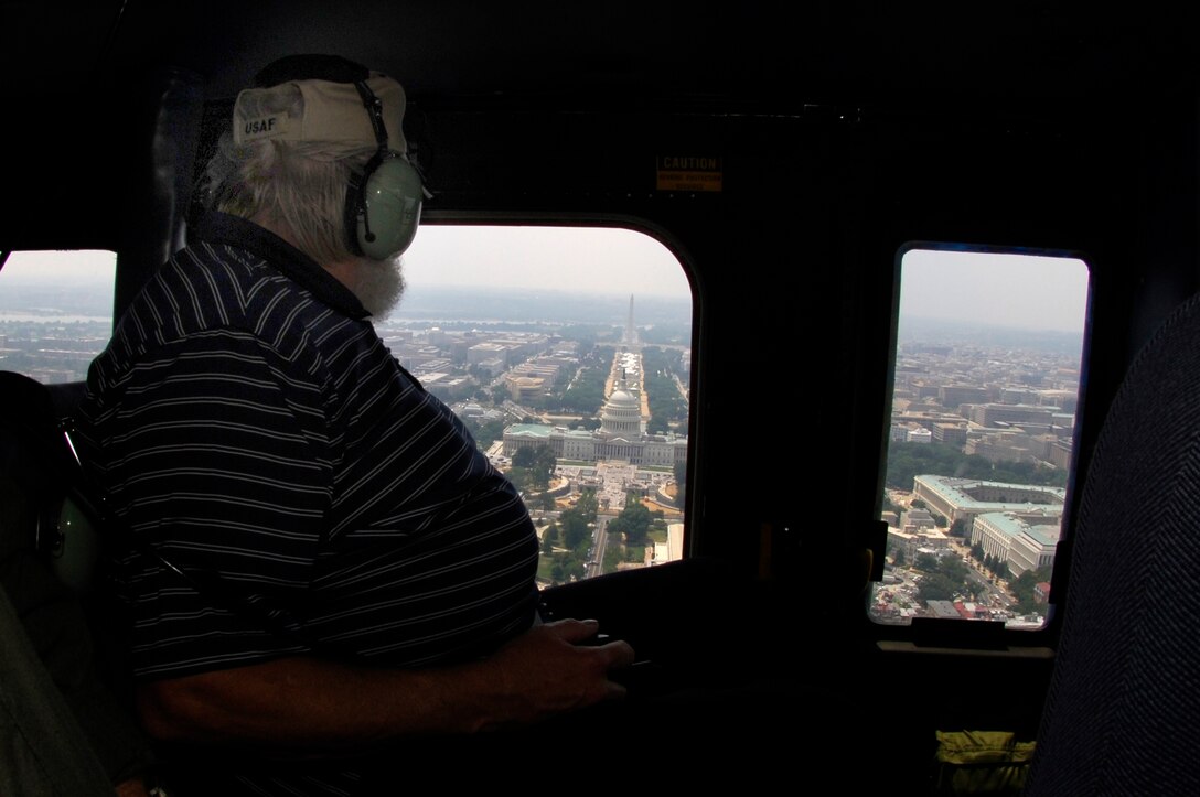ANDREWS AIR FORCE BASE, Md --Country Western singing star Charlie Daniels enjoys a flight over Washington DC with the 1st Helicopter Squadron. Charlie Daniels was visiting Andrews for an event hosted by AAFES at the Base Exchange Tuesday.  (U.S. Air Force photo/Tech. Sgt. Christopher J. Matthews)