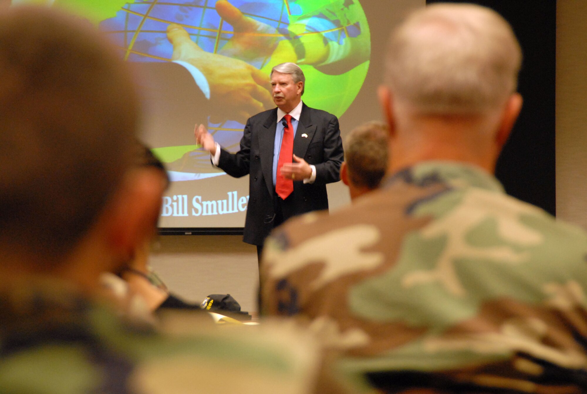 Retired Col. William Smullen speaks to Team Edwards about the importance of the United States' image to the world during the leadership lecture series at the Conference Center Tuesday. There are two more lectures scheduled, which will conclude the series. One is set for July 10 and the other is slated for the end of August. (Photo by Airman Mike Young)