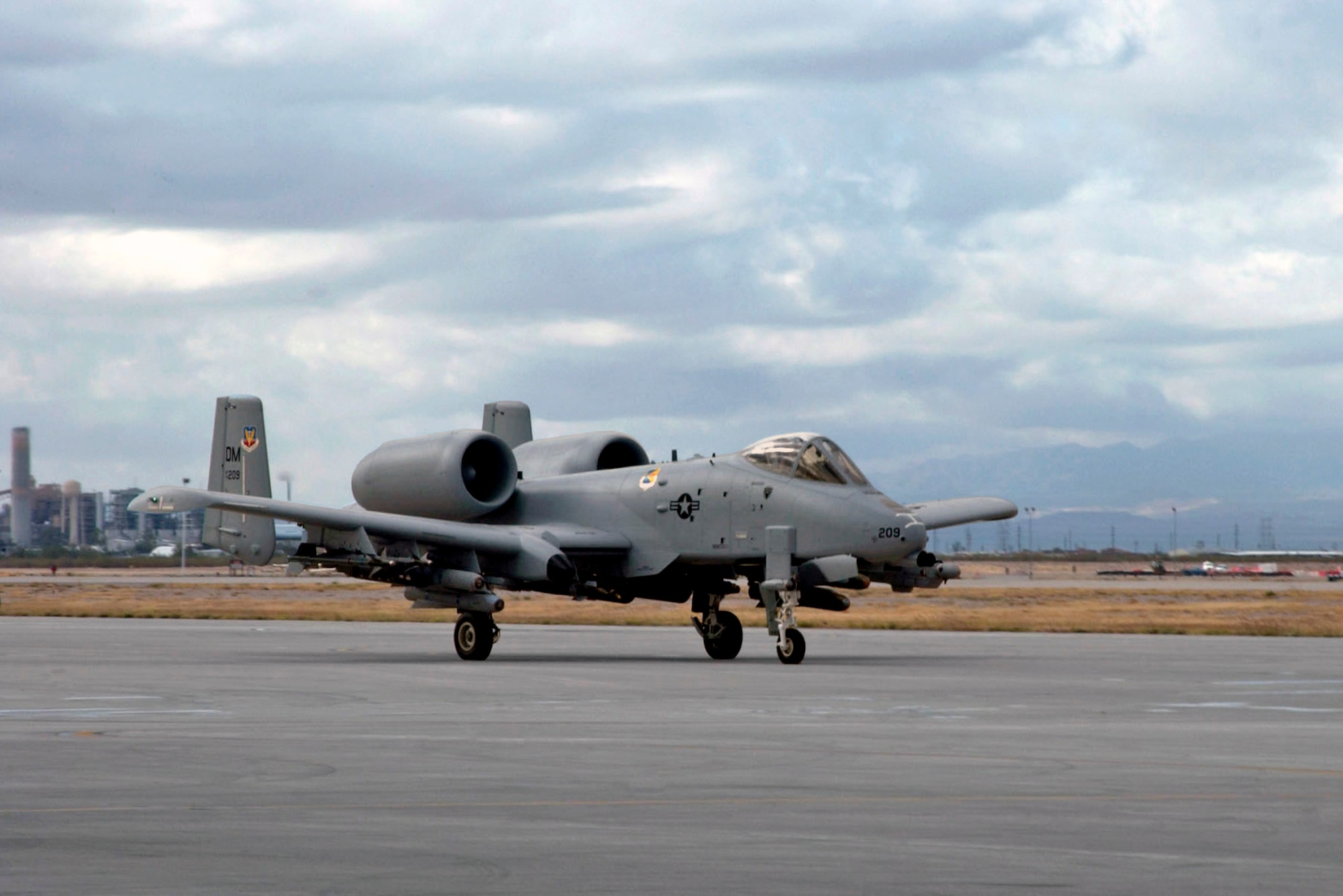 A newly modified A-10C Thunderbolt II taxis in during the roll-out ceremony Nov. 29 at Davis-Monthan Air Force Base, Ariz. The A-10 has been modified with precision engagement technology to create an improved A-10C. The enhancements include full integration of sensors, multi-functional color displays and a new hands-on-throttle-and-stick interface. (U.S. Air Force photo/Airman 1st Class Alesia Goosic)